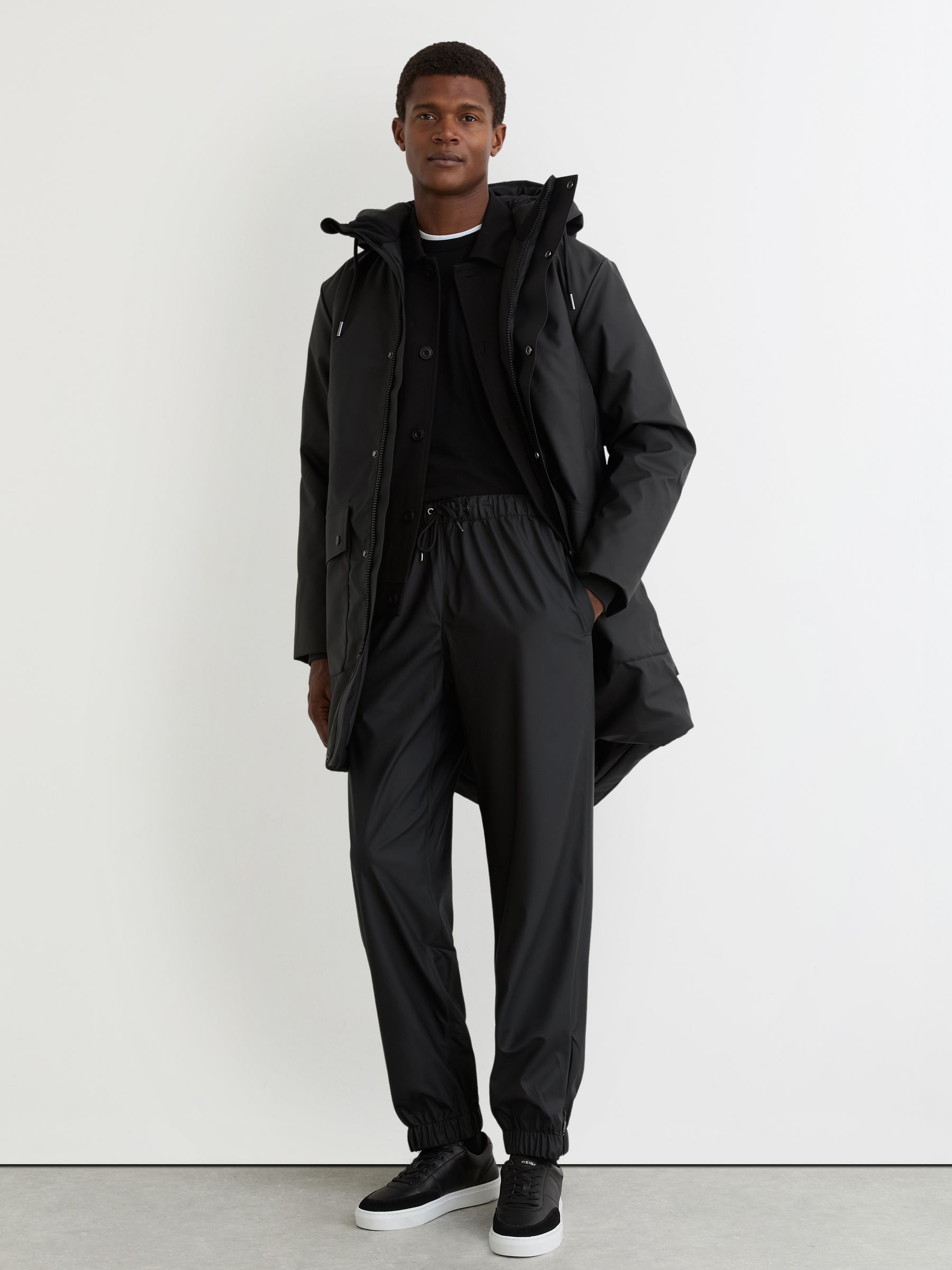 Rains Long Hooded Parka Coat in Black - Image 1 of 5