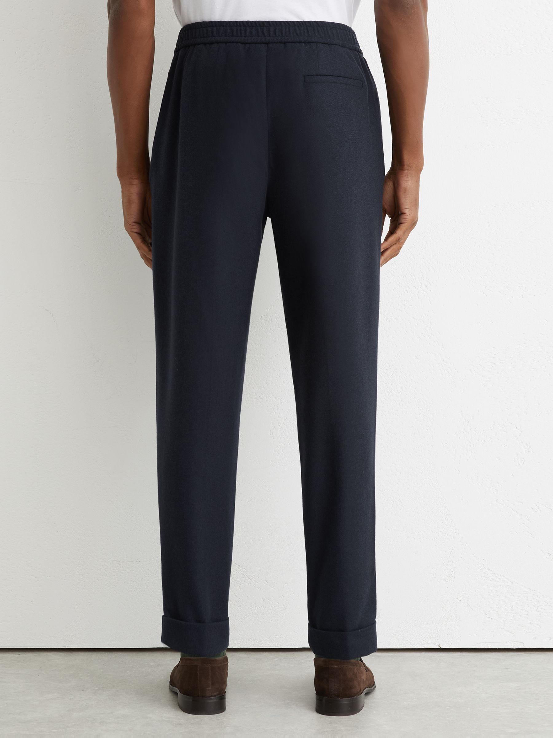 Wool-Blend Tapered Cuffed Trousers in Navy - image 4