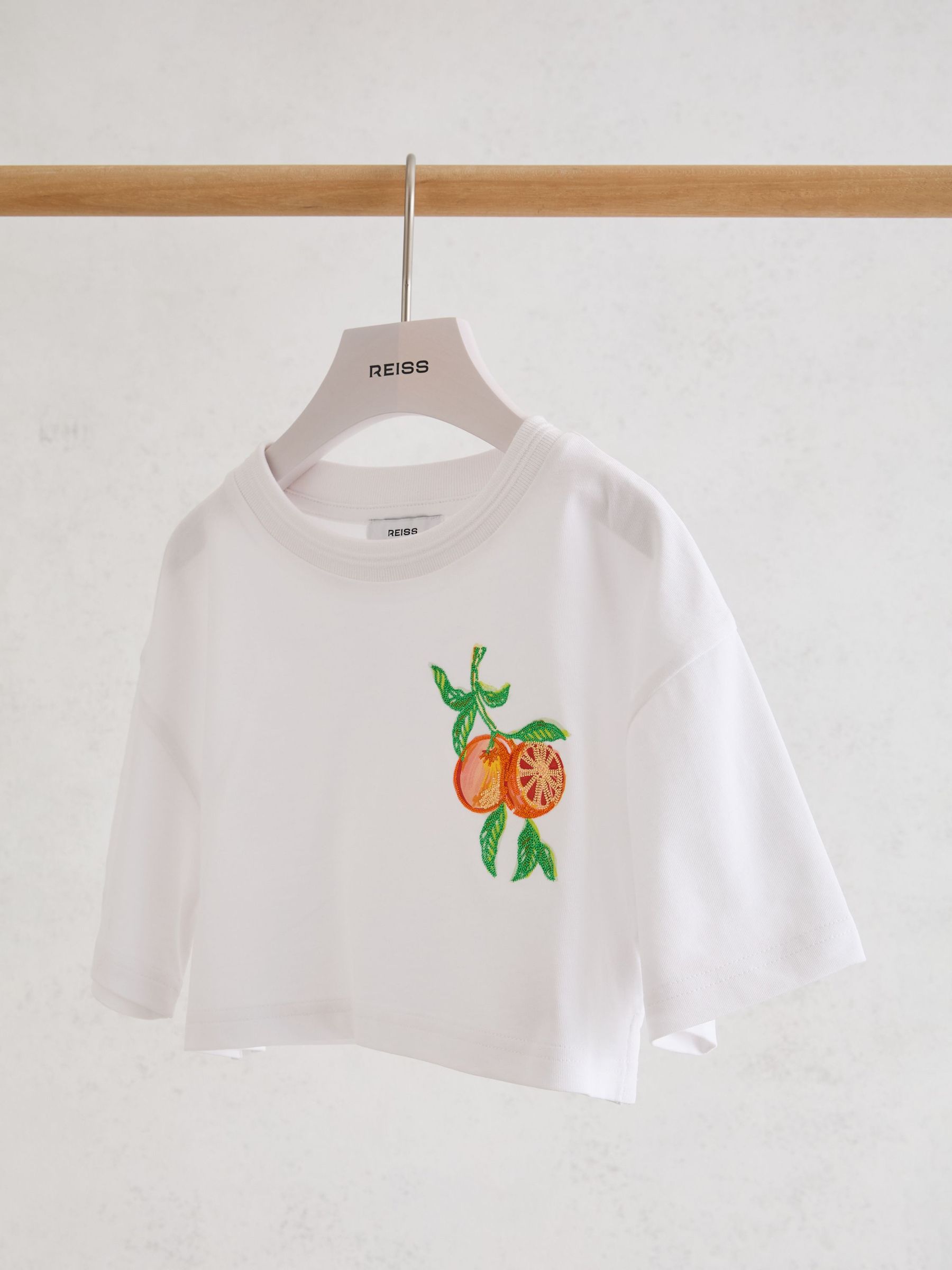 Cotton Embroidered Cropped T-Shirt in White - Image 1 of 3