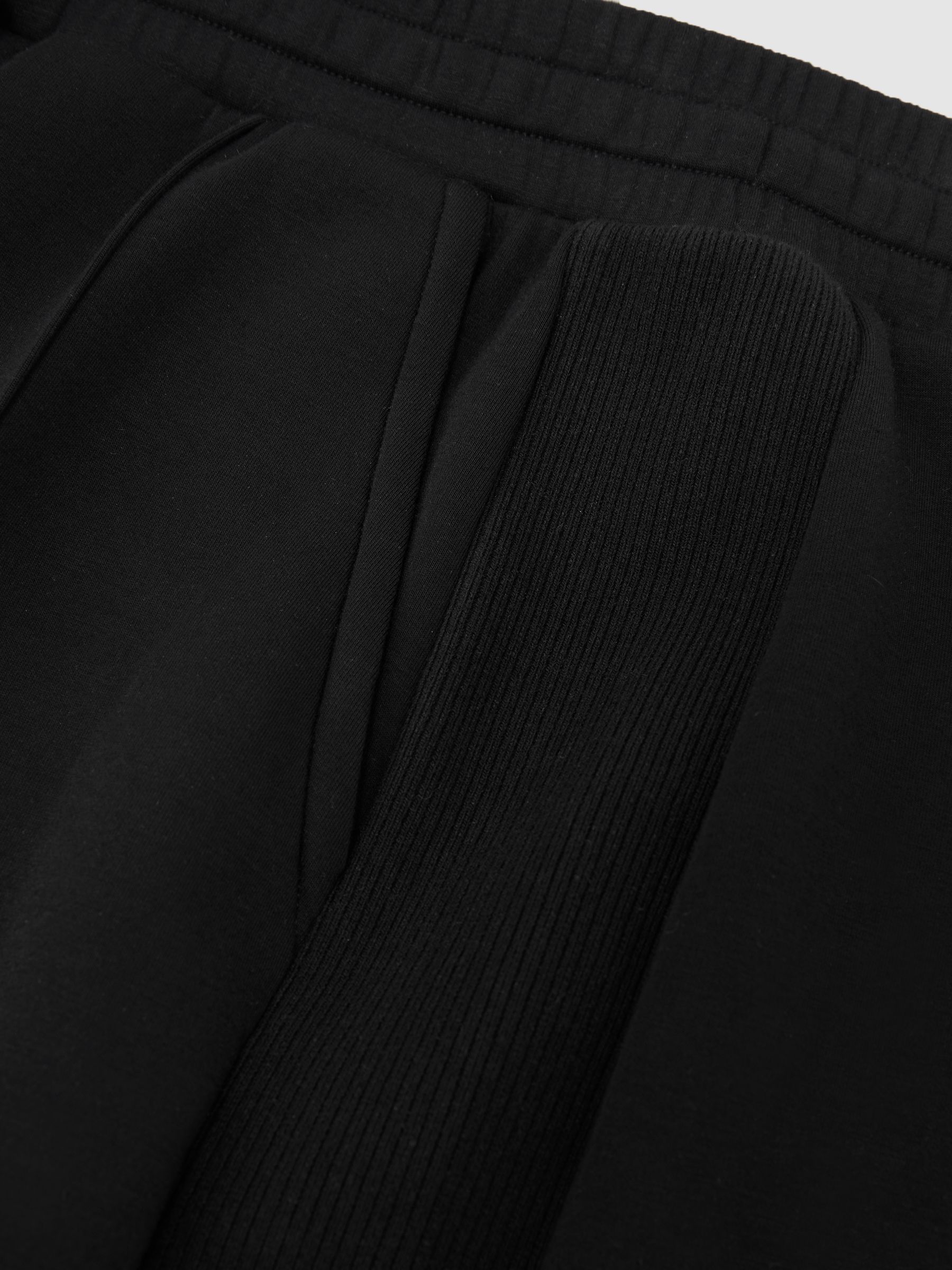Premium Interlock Wide-Leg Joggers in Black - Image 7 of 8