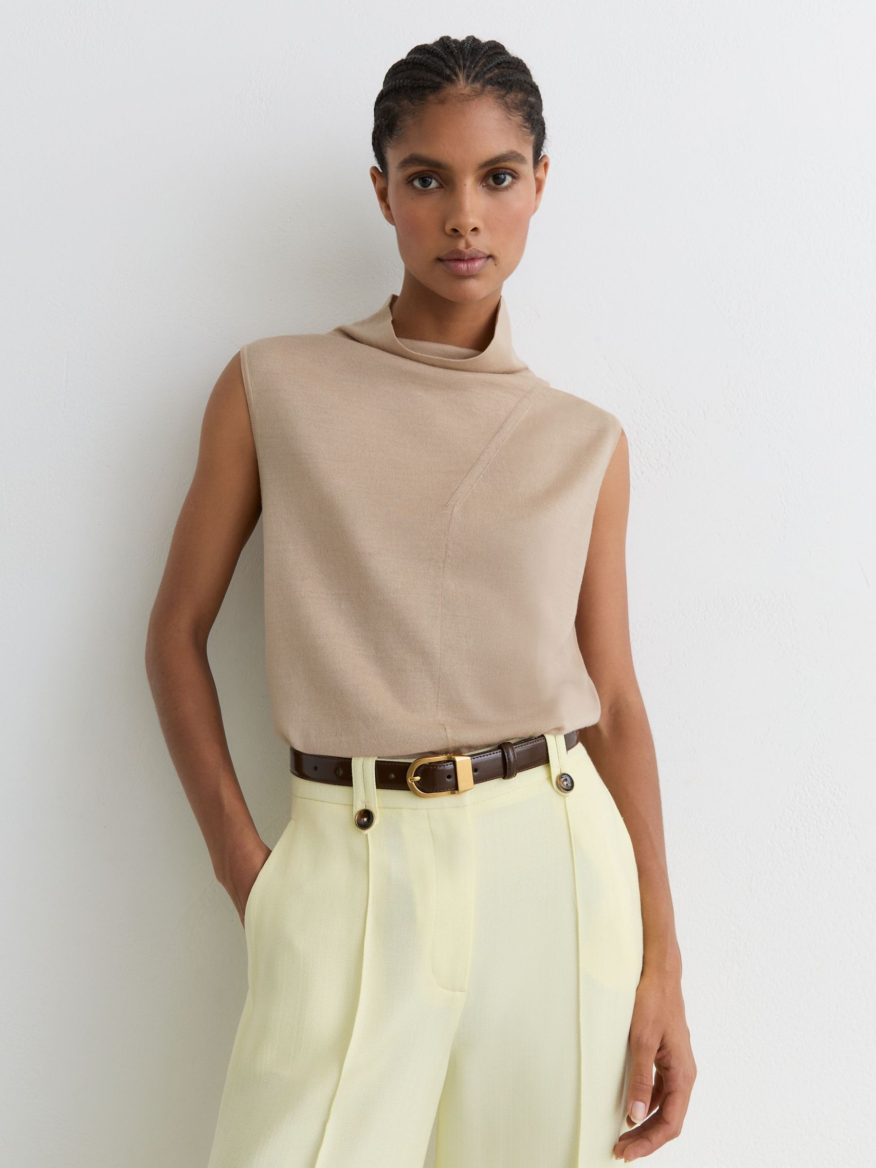 Wool Funnel-Neck Sleeveless Knit Top in Neutral - Image 1 of 6 Wool Funnel-Neck Sleeveless Knit Top in Neutral - Image 1 of 6