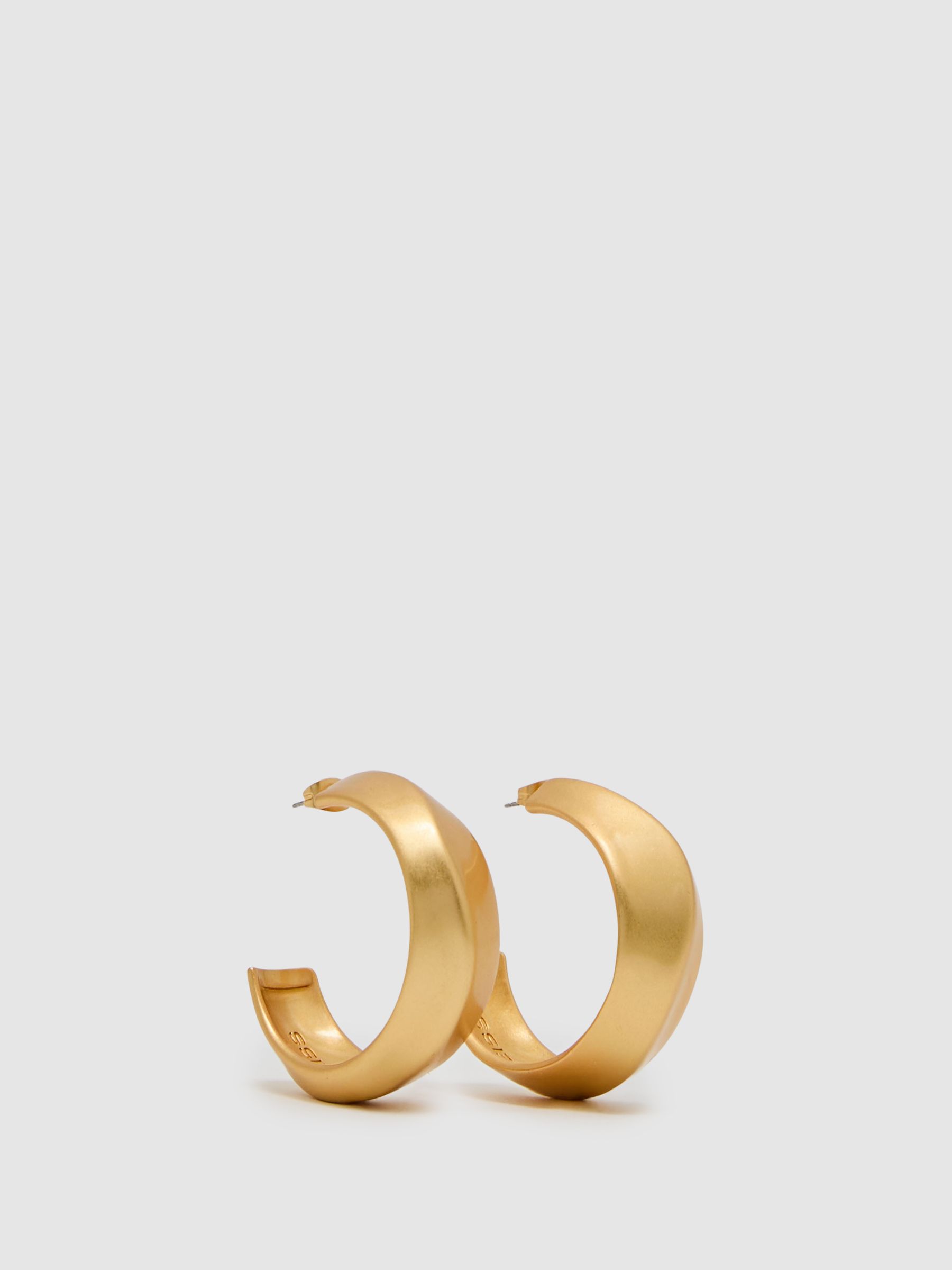 Twist Hoop Earrings in Gold - Image 1 of 4