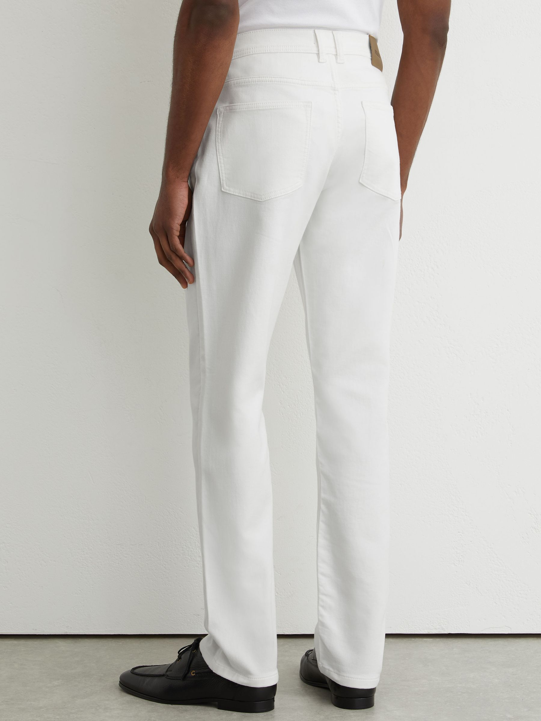 Soft-Stretch Straight-Leg Jeans in White - image 5