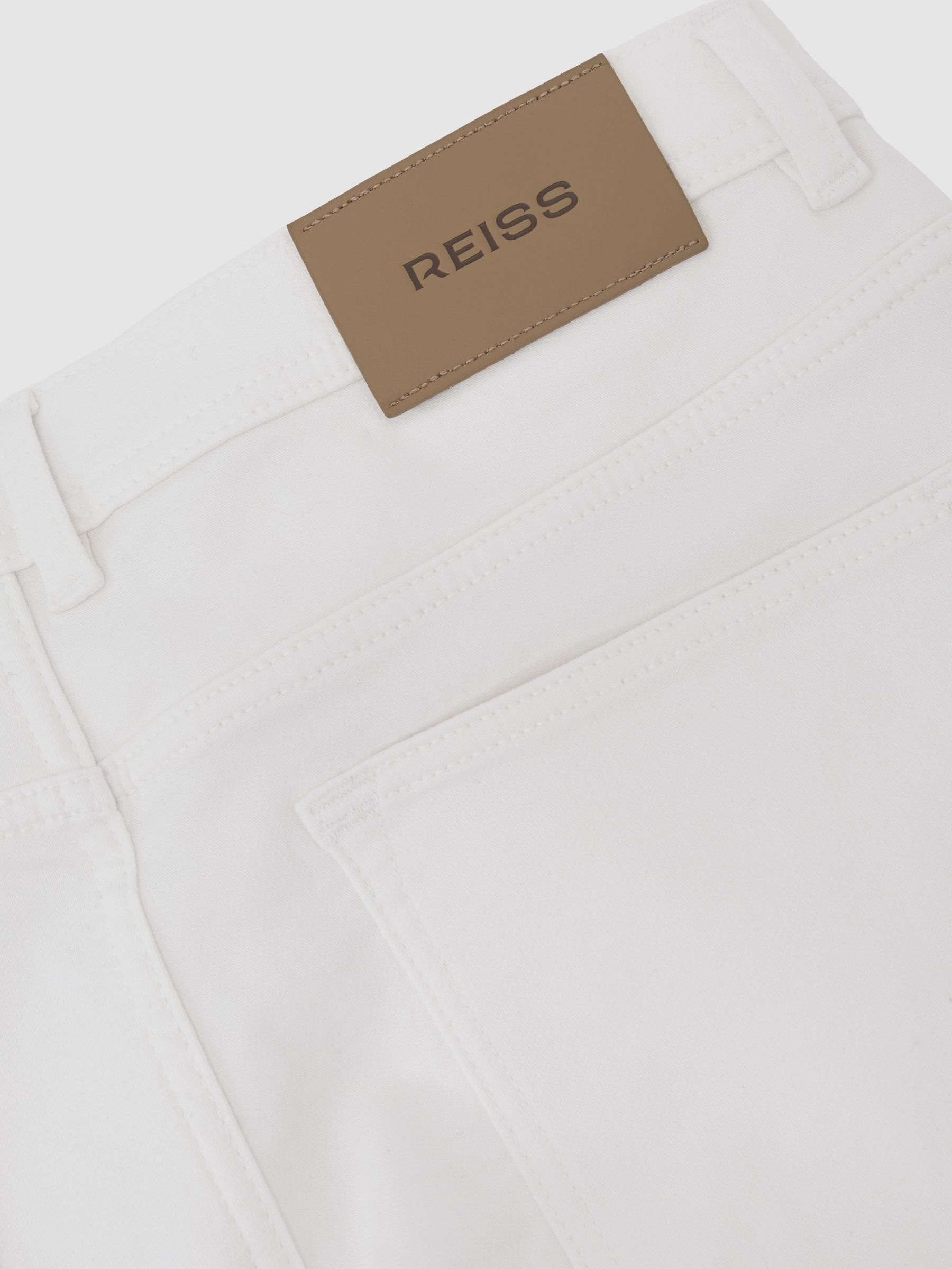 Soft-Stretch Straight-Leg Jeans in White - image 3