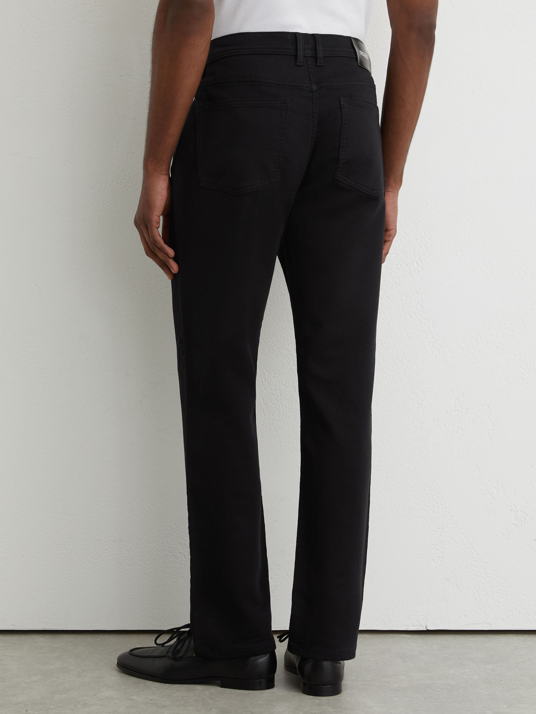 Soft-Stretch Straight-Leg Jeans in Solid Black - Image 4 of 7
