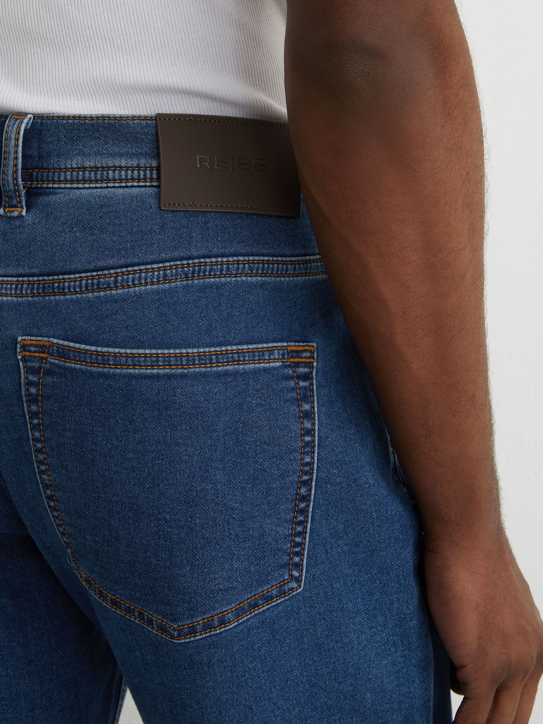 Soft-Stretch Straight-Leg Jeans in Dark Rinsed Blue Wash - Image 6 of 7