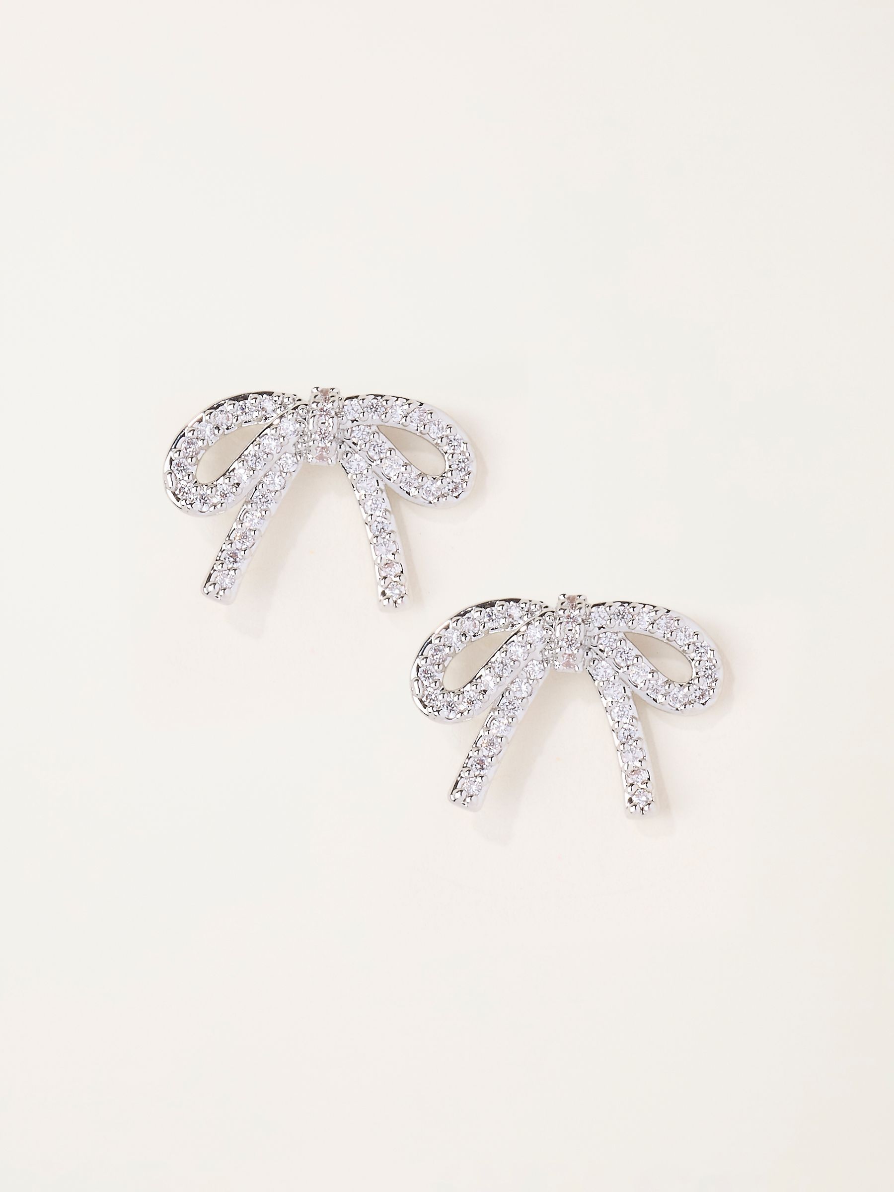 Silver Tone Bow Party Earrings - Image 1 of 4