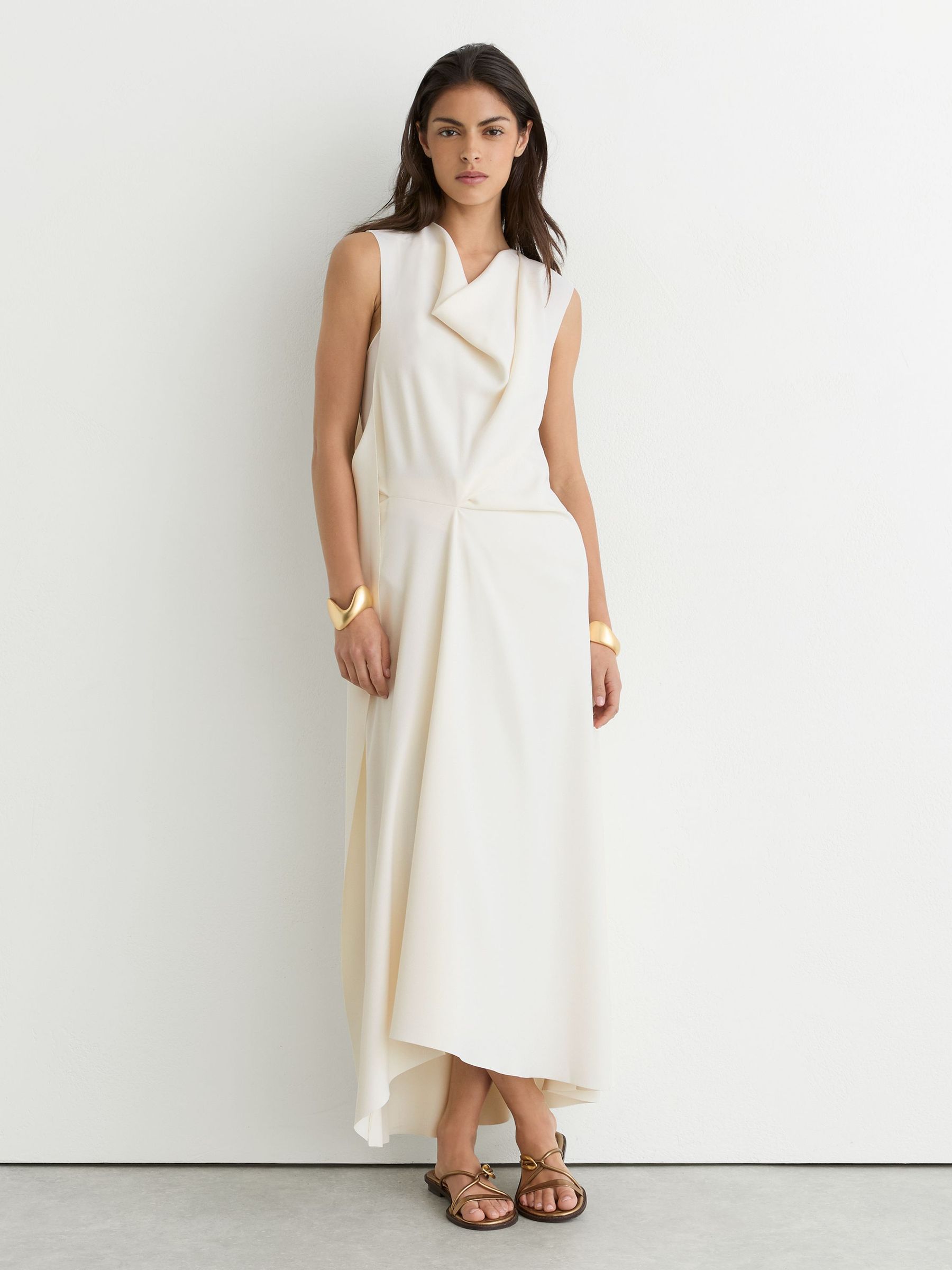 Drape-Detail Sleeveless Midi Dress in Ivory - Image 1 of 7 Drape-Detail Sleeveless Midi Dress in Ivory - Image 1 of 7