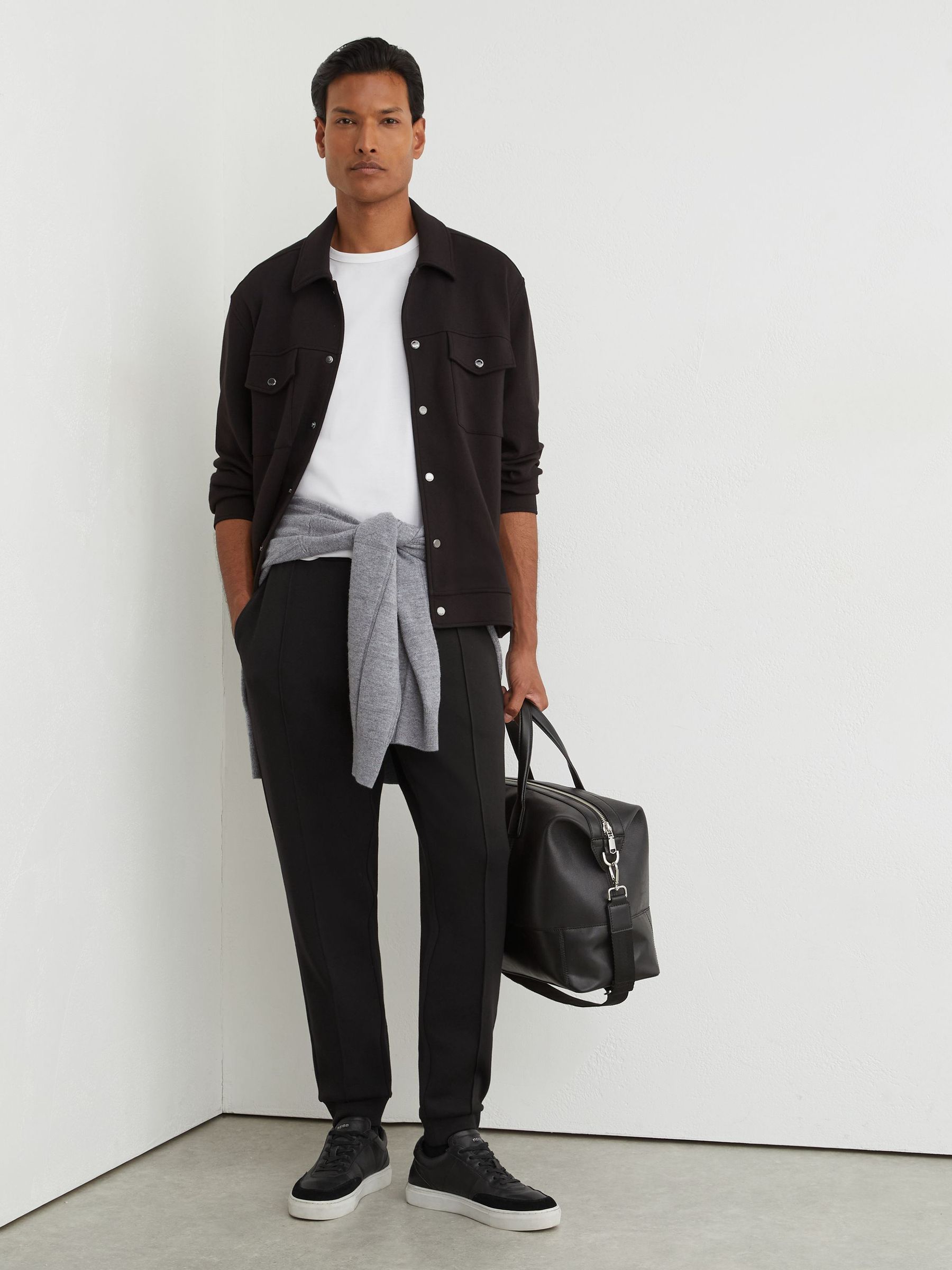 Premium Interlock Cuffed Joggers in Black - Image 1 of 6