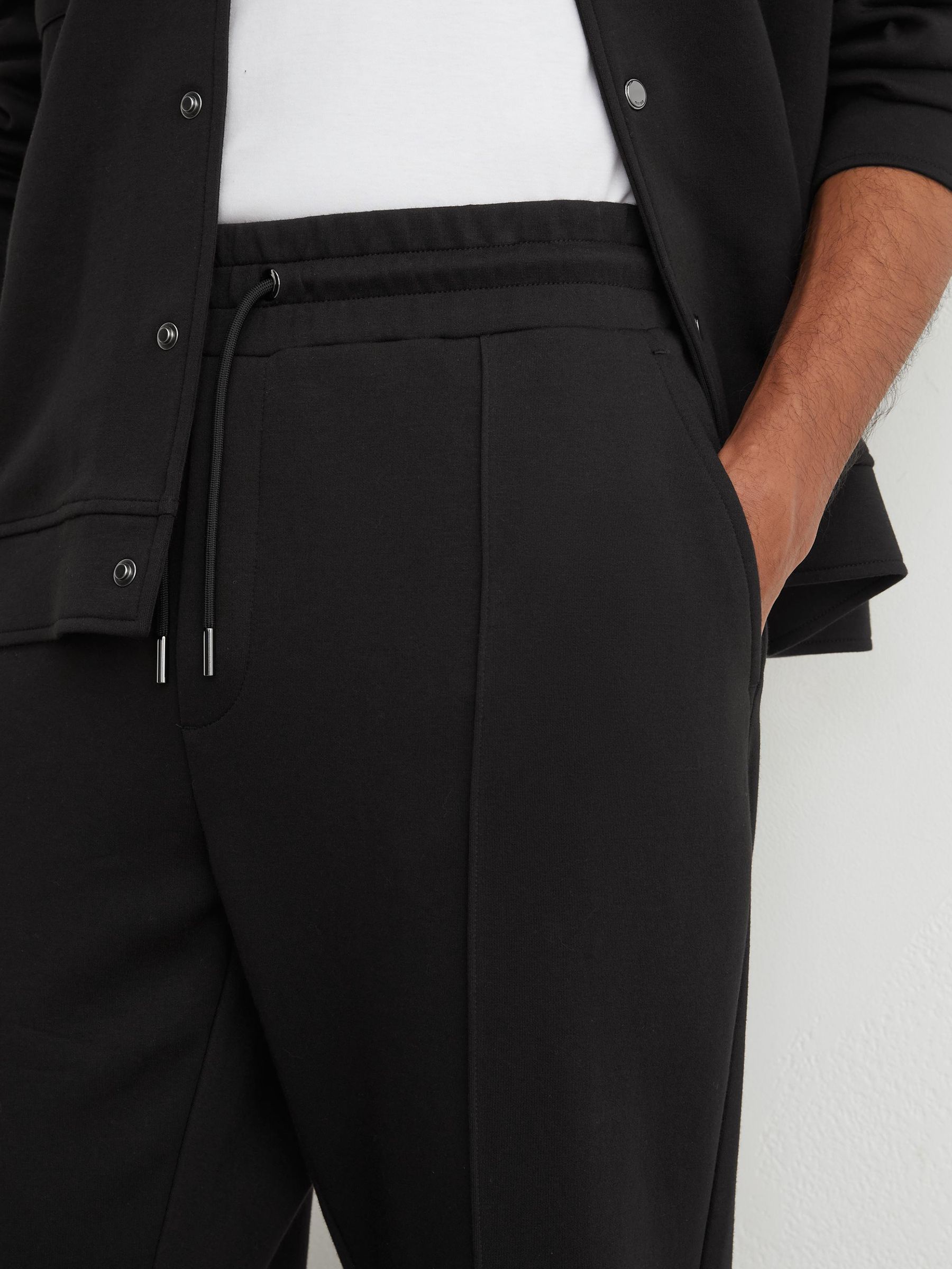 Premium Interlock Cuffed Joggers in Black - Image 4 of 6