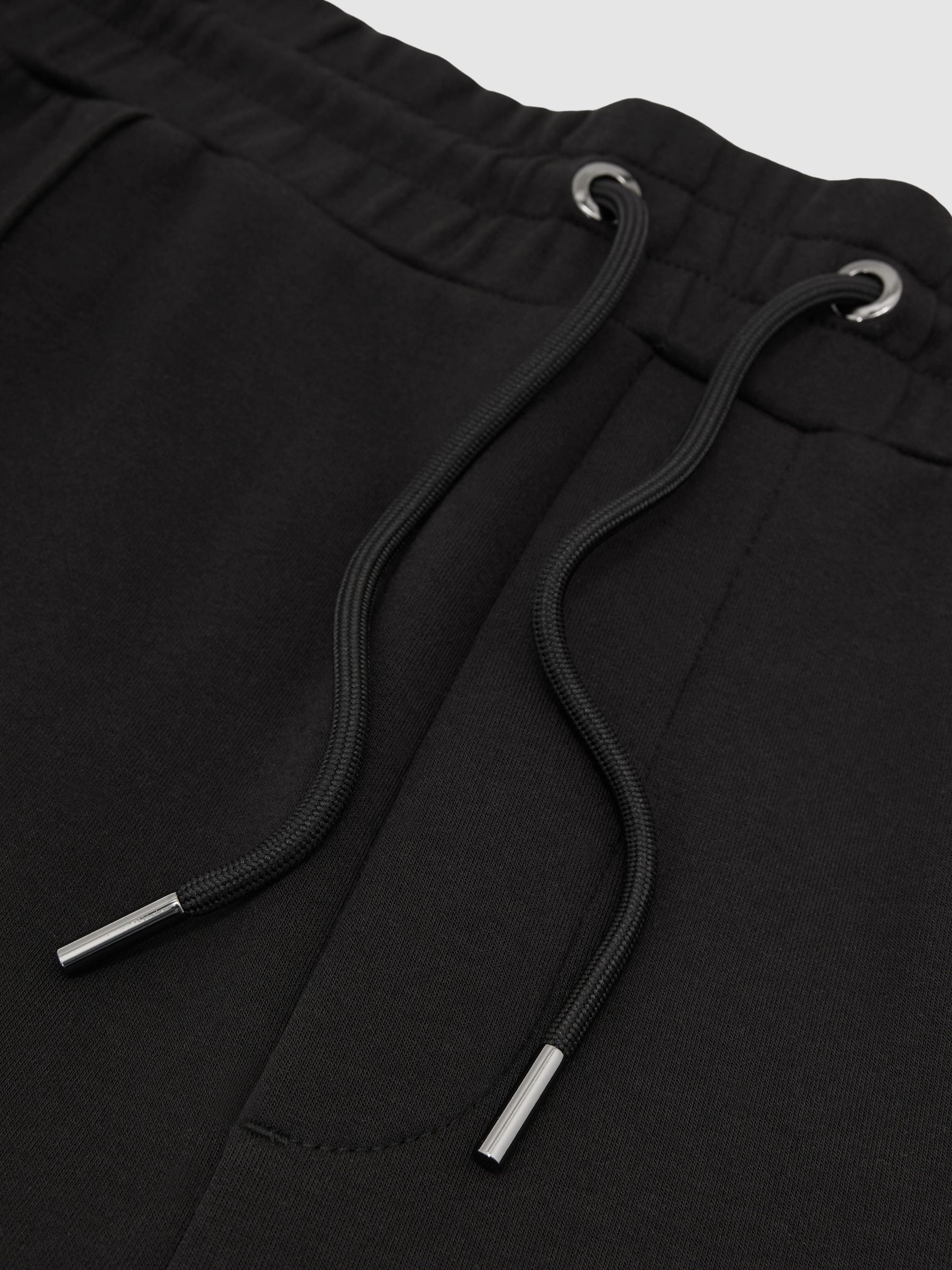 Premium Interlock Cuffed Joggers in Black - Image 6 of 6