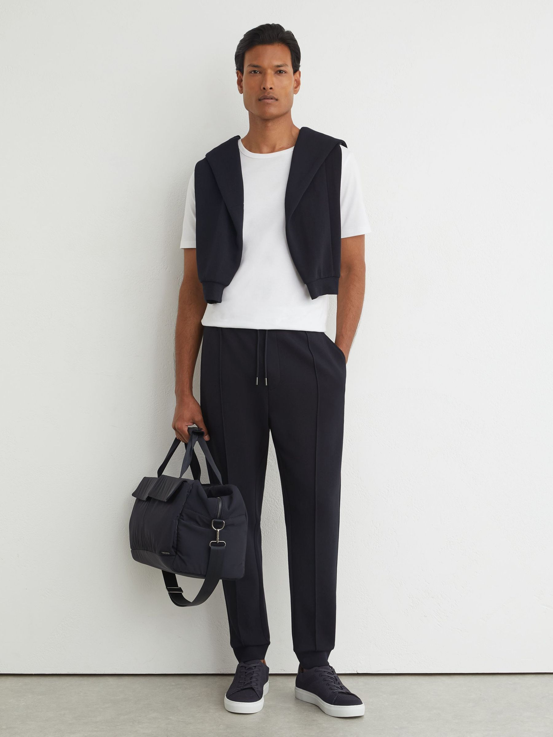 Premium Interlock Cuffed Joggers in Navy - Image 1 de 7