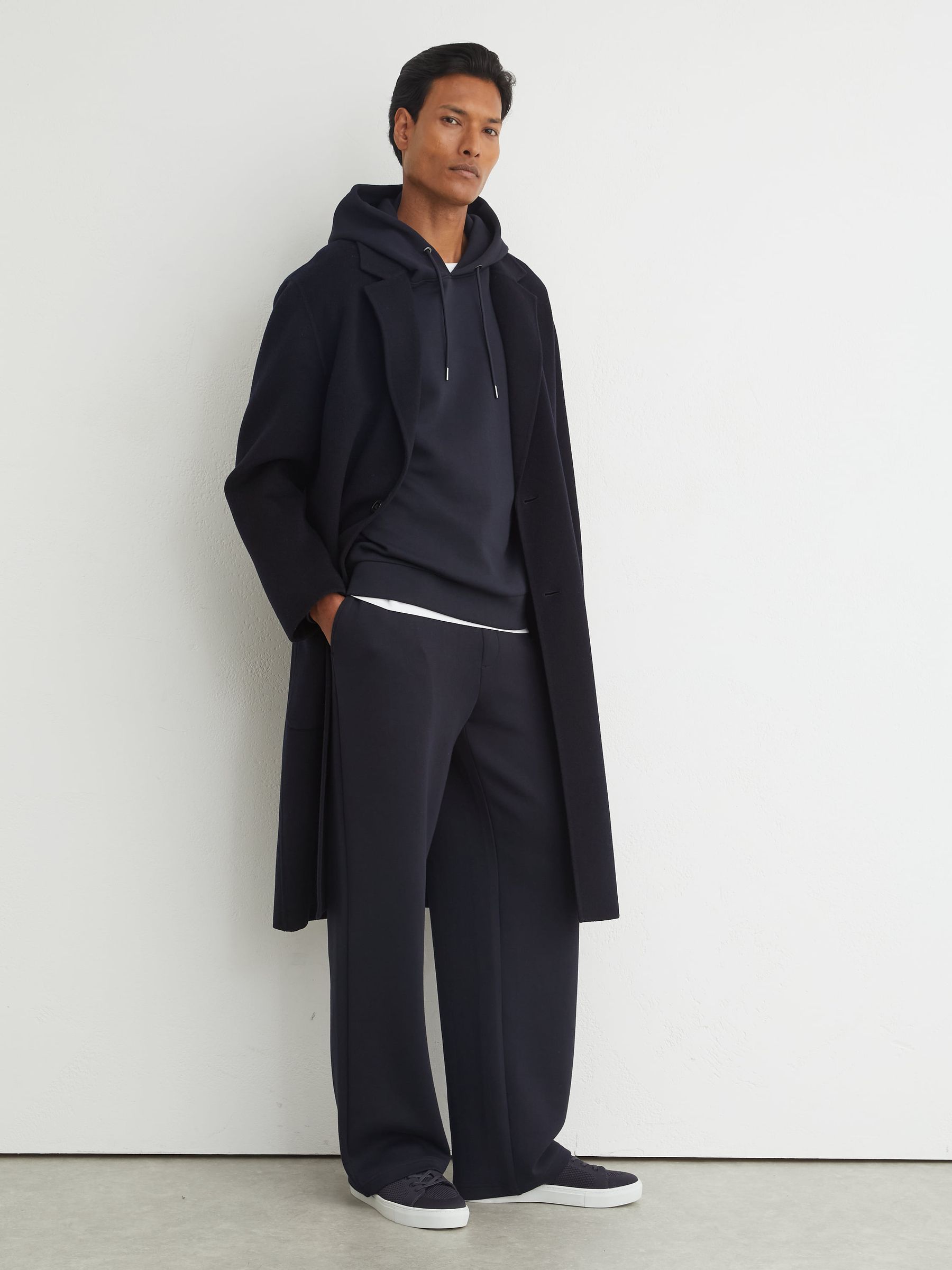 Premium Interlock Relaxed-Fit Joggers in Navy - Image 1 of 7