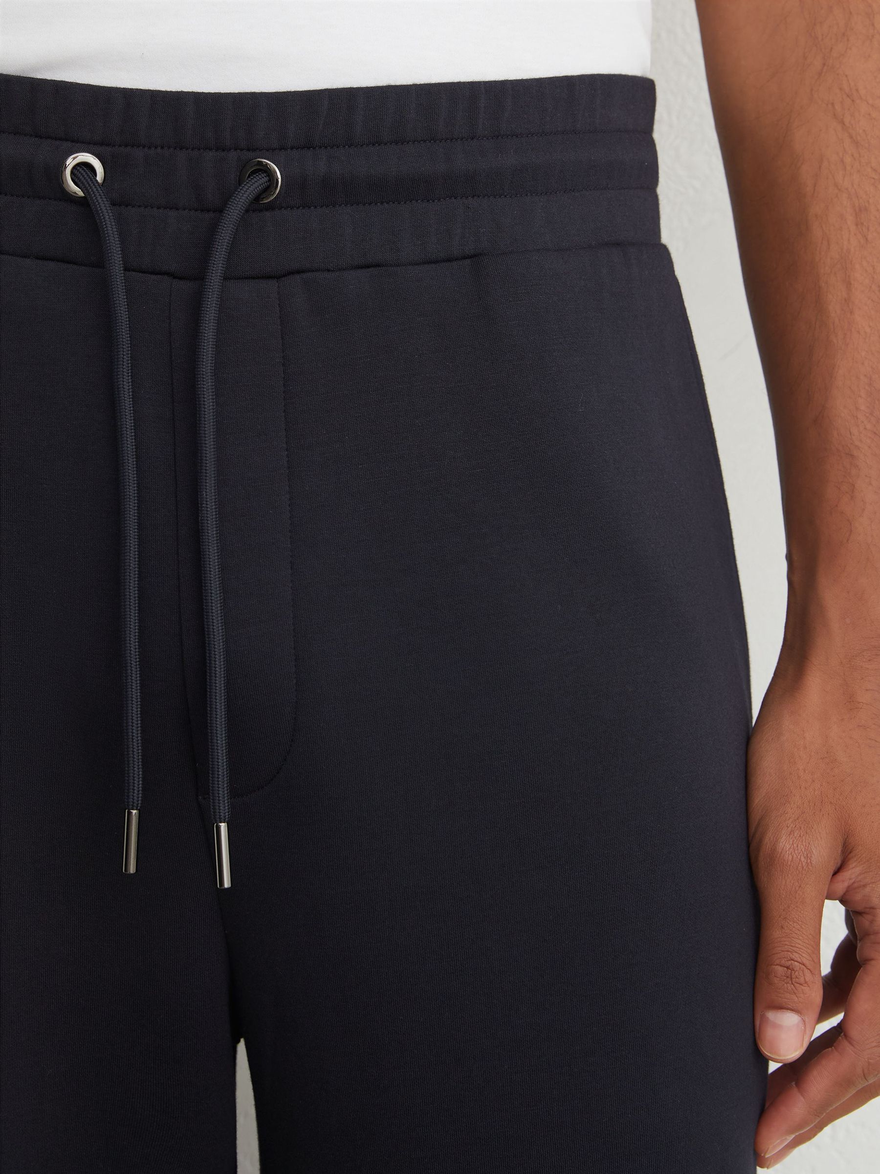 Premium Interlock Relaxed-Fit Joggers in Navy - Image 4 of 7
