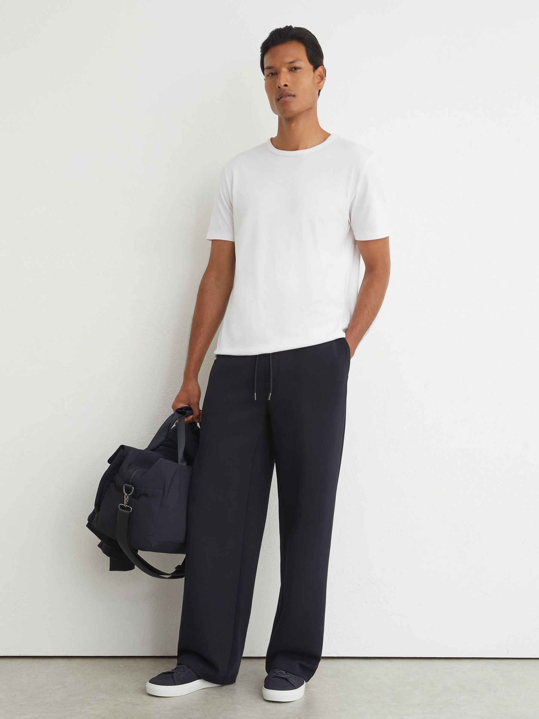 Premium Interlock Relaxed-Fit Joggers in Navy - Image 6 of 7