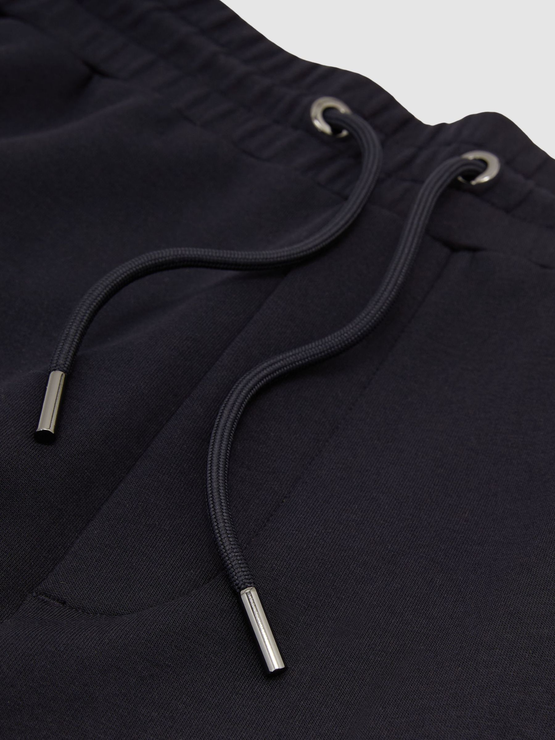 Premium Interlock Relaxed-Fit Joggers in Navy - Image 7 of 7