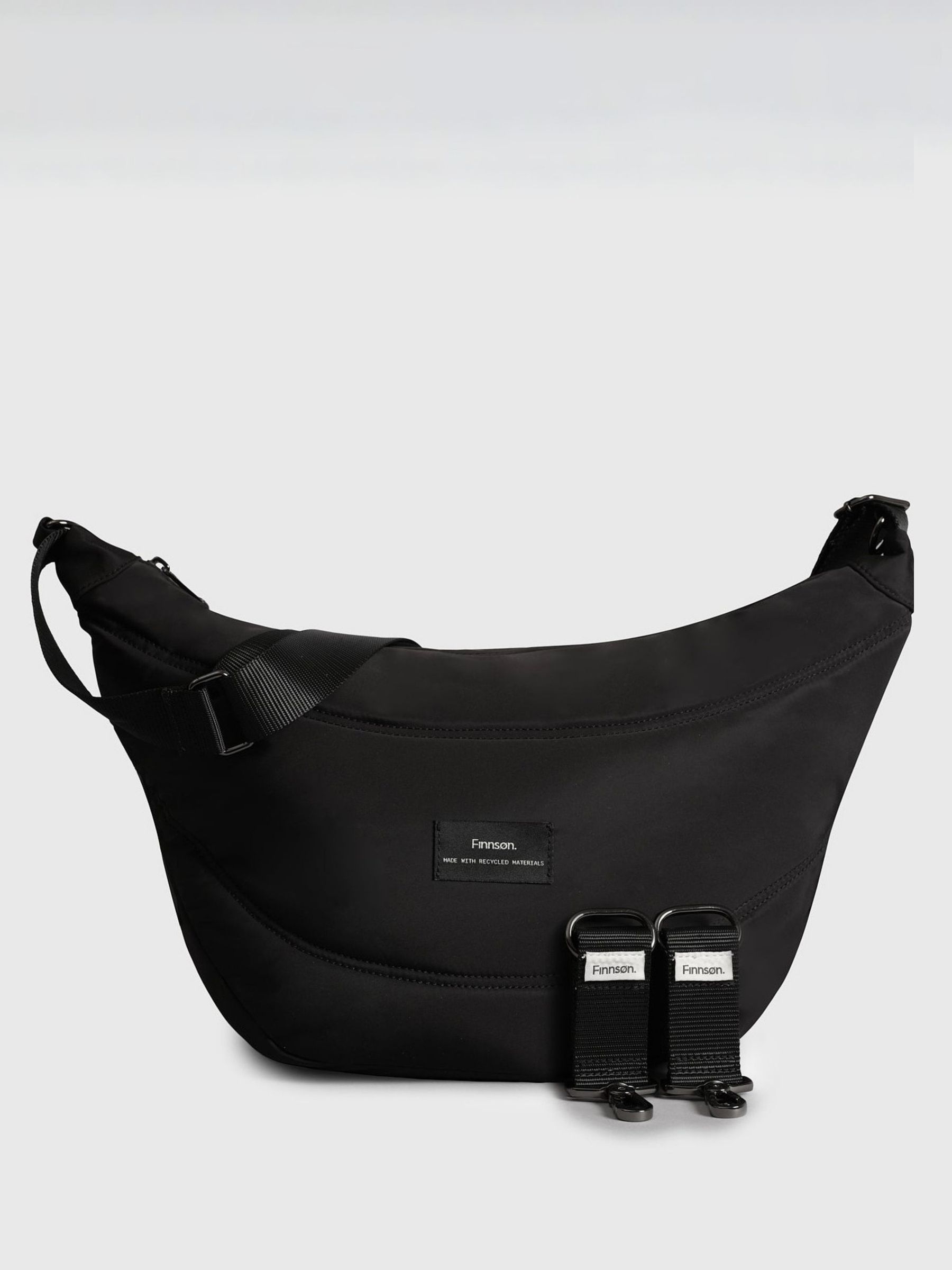 Finnson Black Osma Sling Changing Bag With Stroller Clips - Image 1 of 5 Finnson Black Osma Sling Changing Bag With Stroller Clips - Image 1 of 5