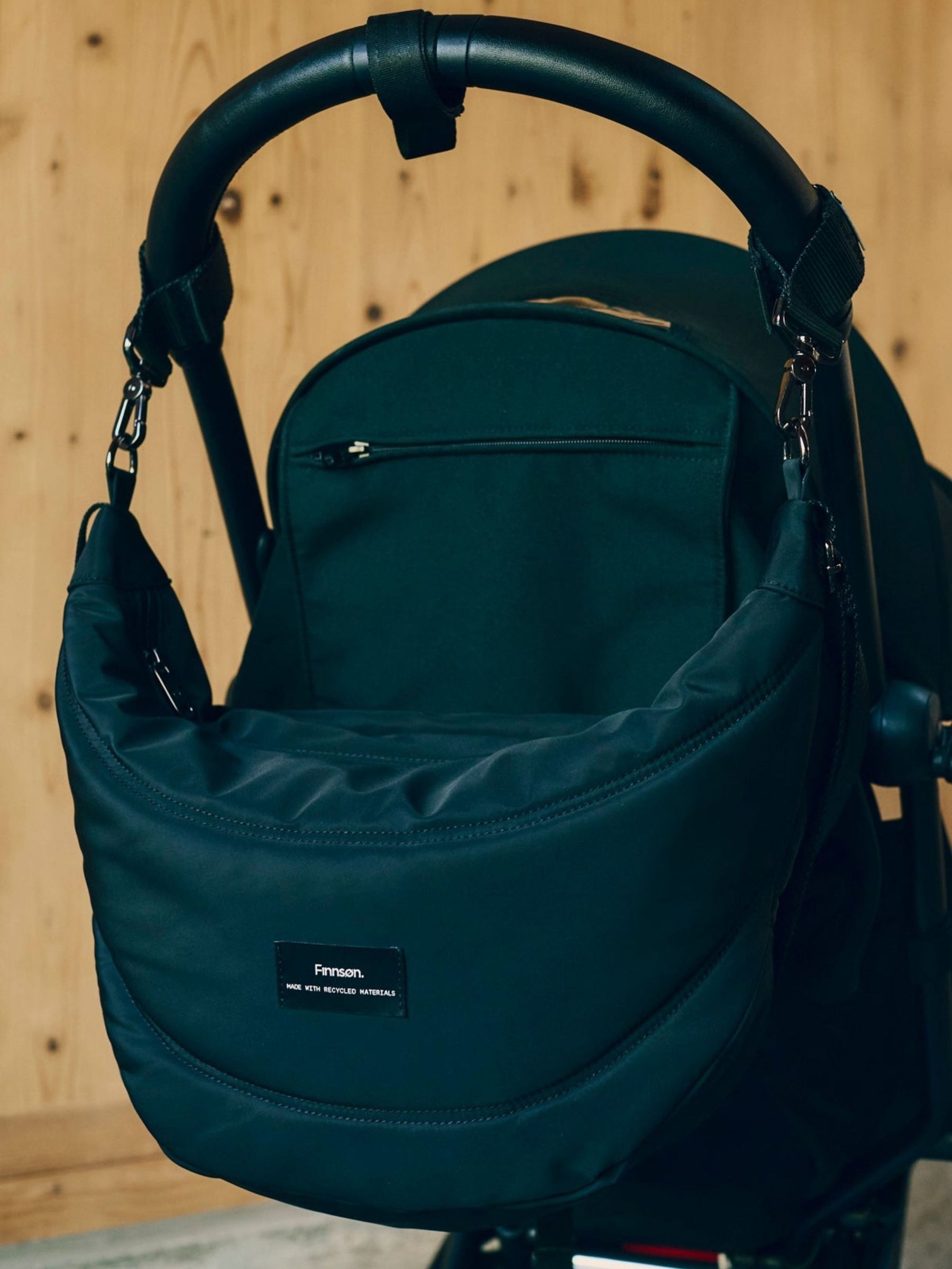 Finnson Black Osma Sling Changing Bag With Stroller Clips - Image 2 of 5 Finnson Black Osma Sling Changing Bag With Stroller Clips - Image 2 of 5