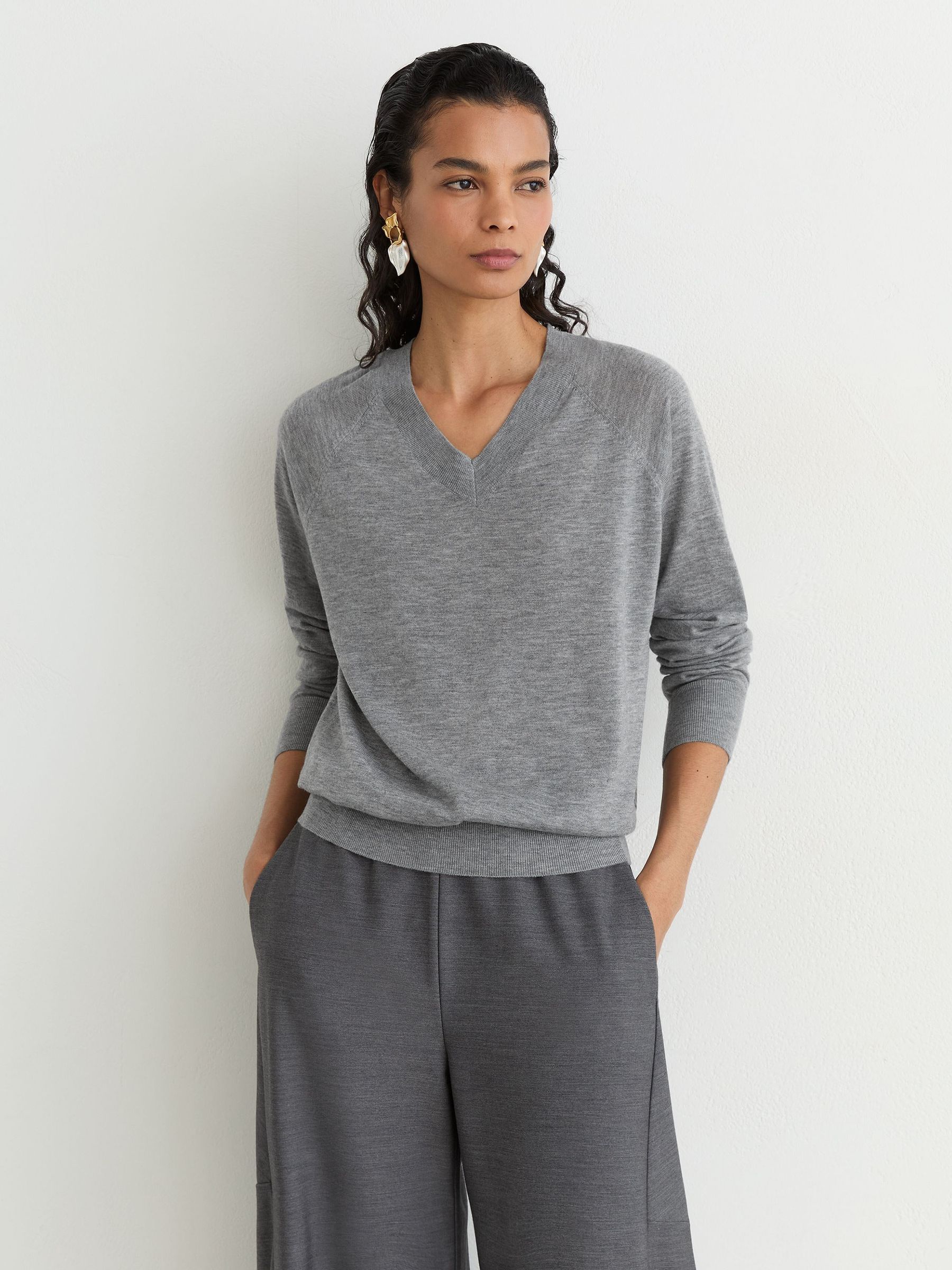 Merino Wool V-Neck Jumper in Grey - Image 1 of 6 Merino Wool V-Neck Jumper in Grey - Image 1 of 6