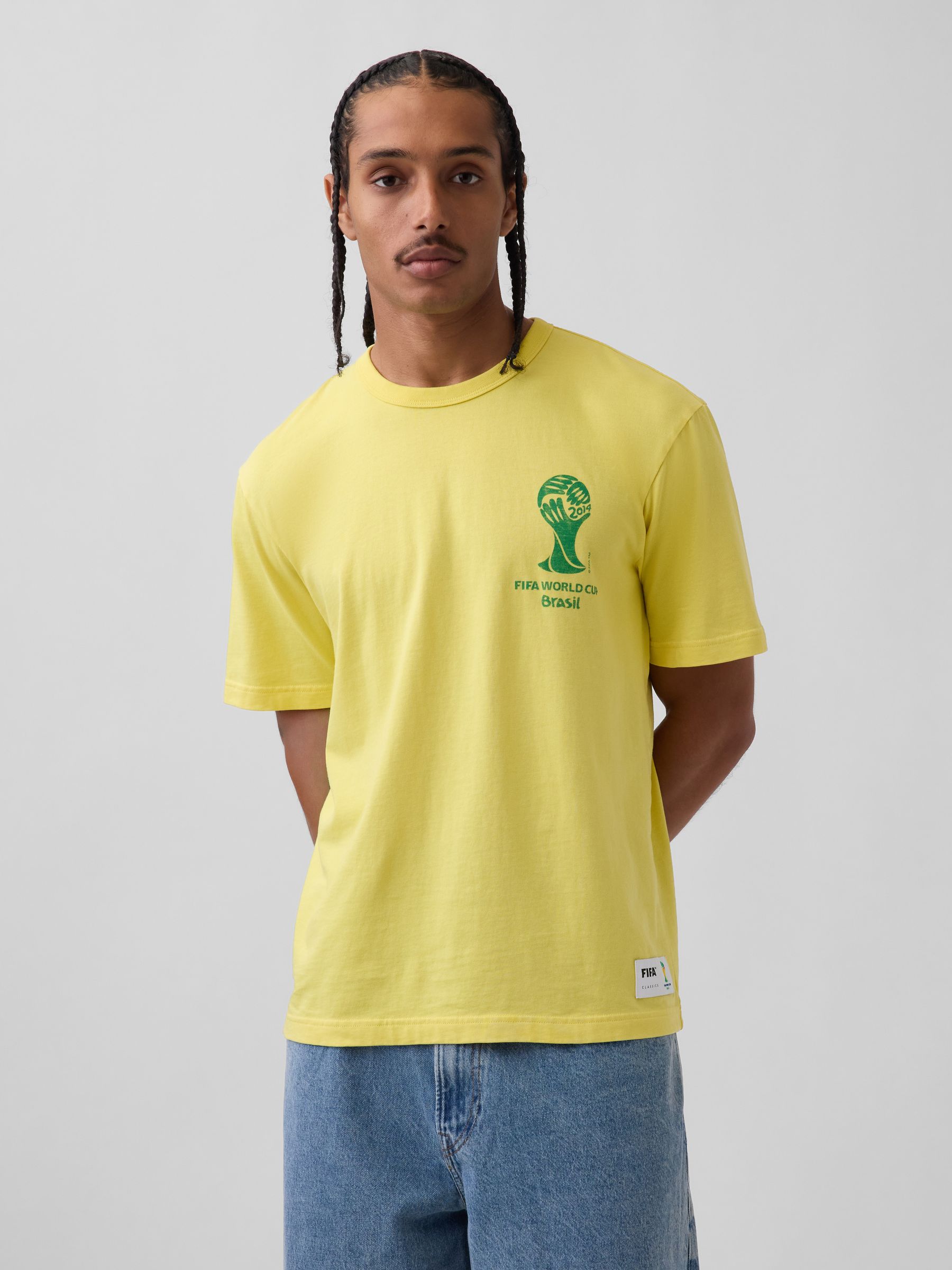 Yellow Brazil FIFA WORLD CUP™ Relaxed Graphic Short Sleeve T-Shirt - Image 1 of 5 Yellow Brazil FIFA WORLD CUP™ Relaxed Graphic Short Sleeve T-Shirt - Image 1 of 5