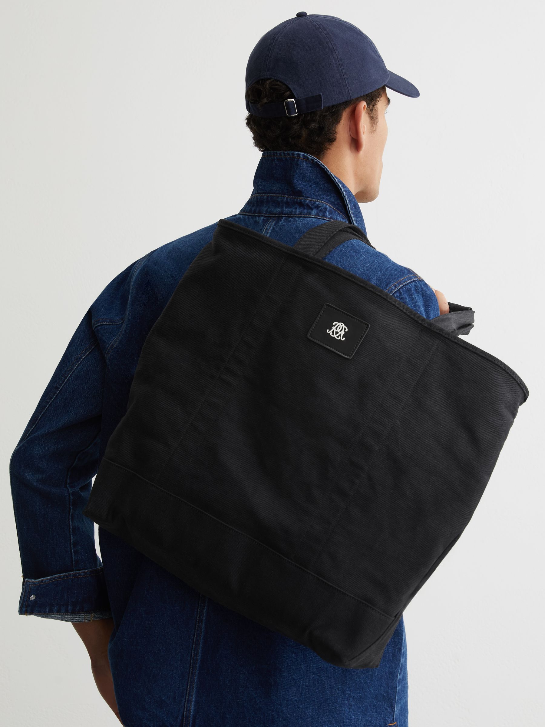 Monogram-Patch Canvas Tote Bag in Black - Image 1 of 6 Monogram-Patch Canvas Tote Bag in Black - Image 1 of 6