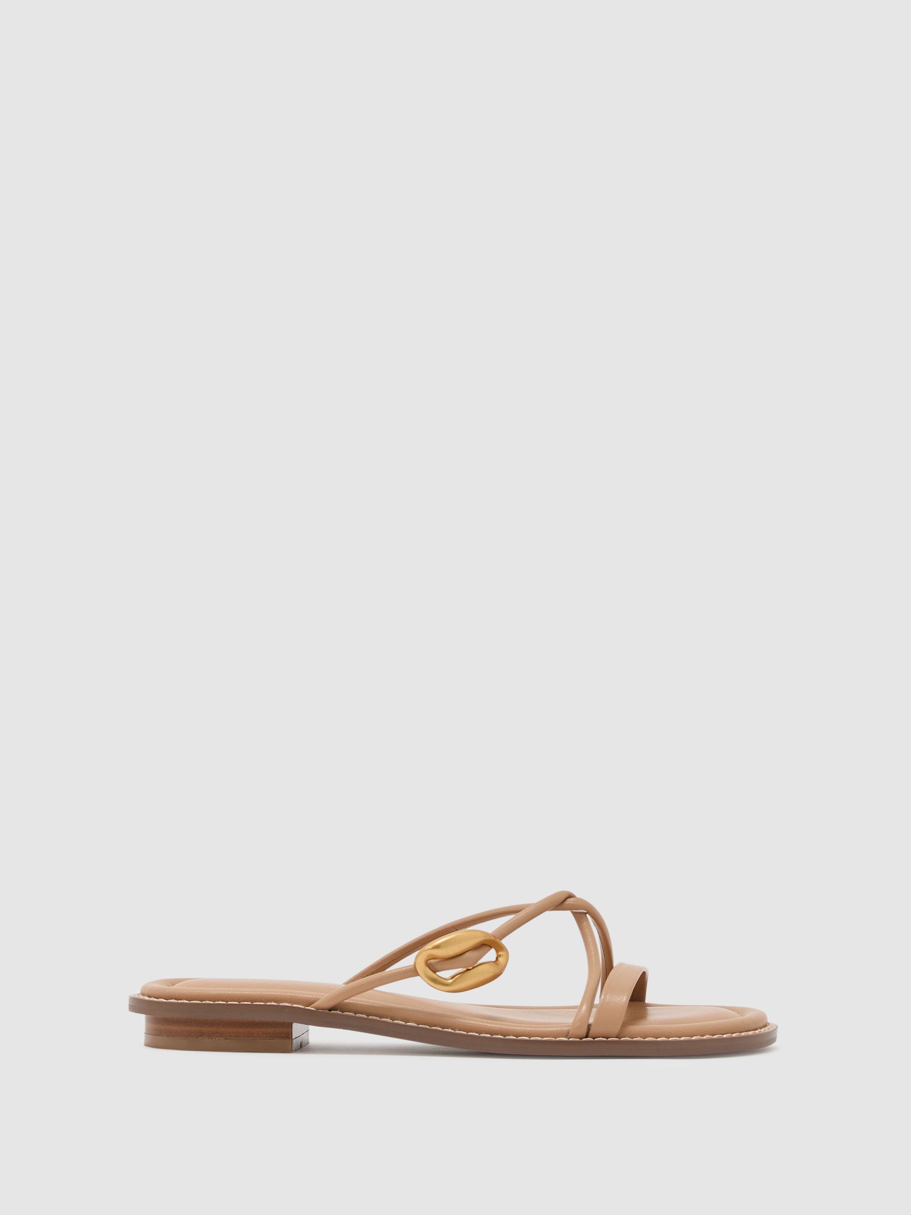 Leather Twist-Strap Flat Sandals in Nude - image 1