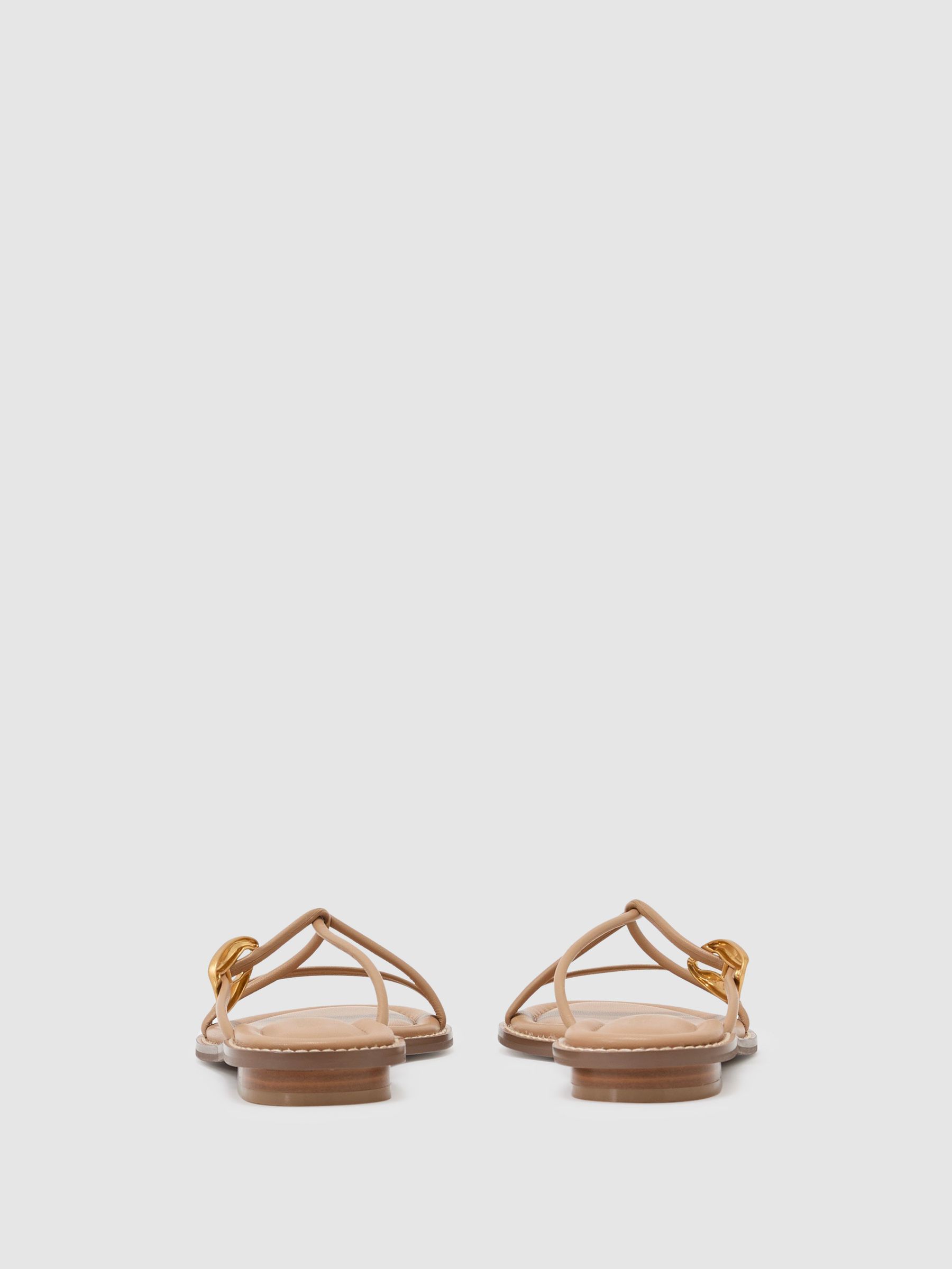 Leather Twist-Strap Flat Sandals in Nude - image 3