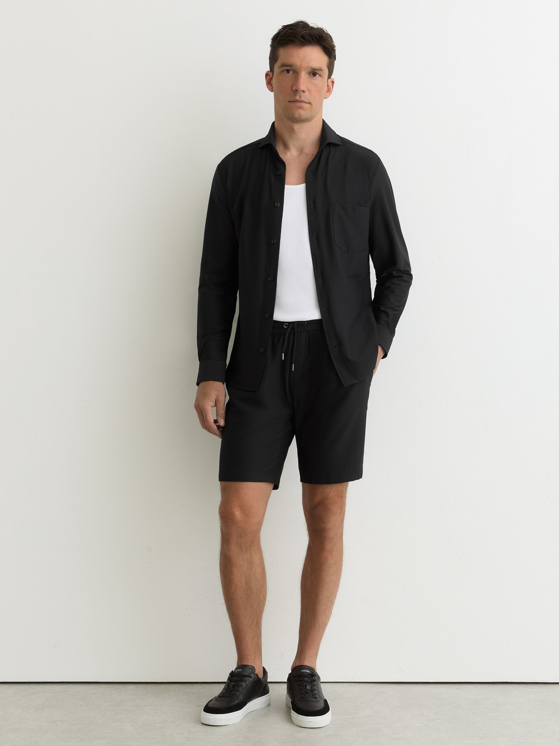 Seersucker Drawstring Shorts in Black - Image 1 of 6 Seersucker Drawstring Shorts in Black - Image 1 of 6