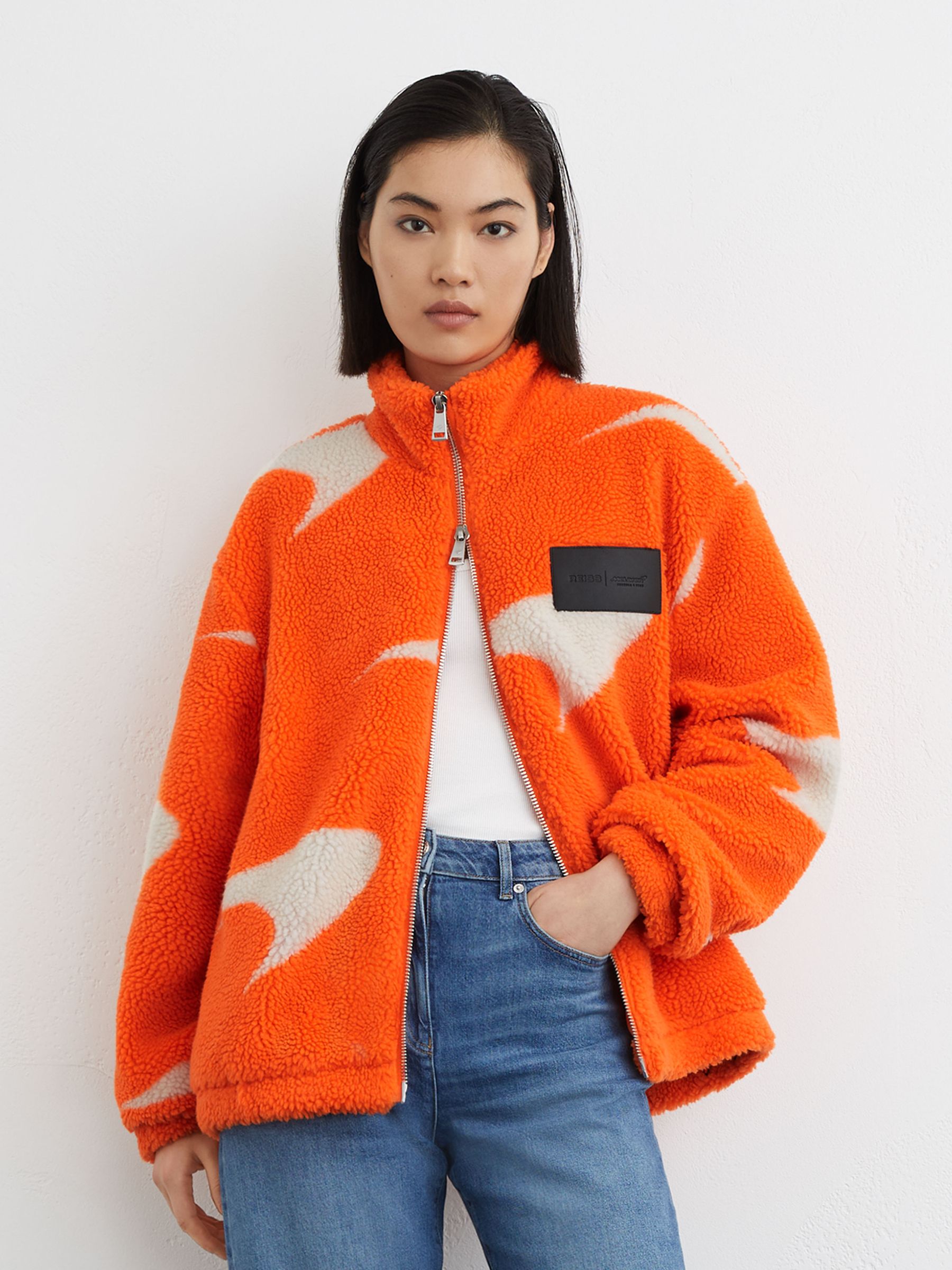 McLaren Racing Speedmark Fleece Jacket Unisex-Fit in Papaya Orange/White - Image 1 of 6 McLaren Racing Speedmark Fleece Jacket Unisex-Fit in Papaya Orange/White - Image 1 of 6