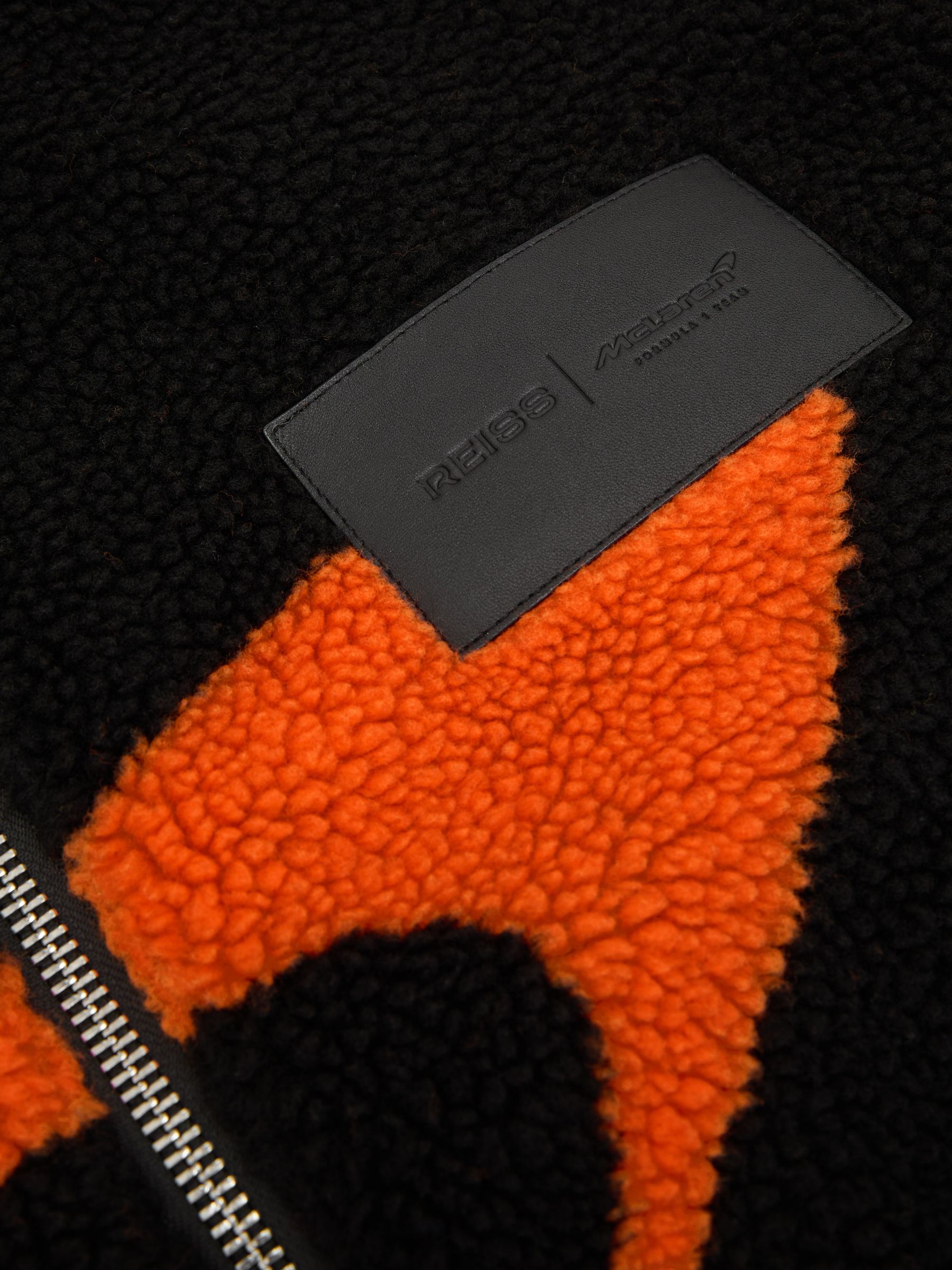 McLaren Racing Speedmark Fleece Jacket Unisex-Fit in Black/Papaya Orange - Image 9 of 9