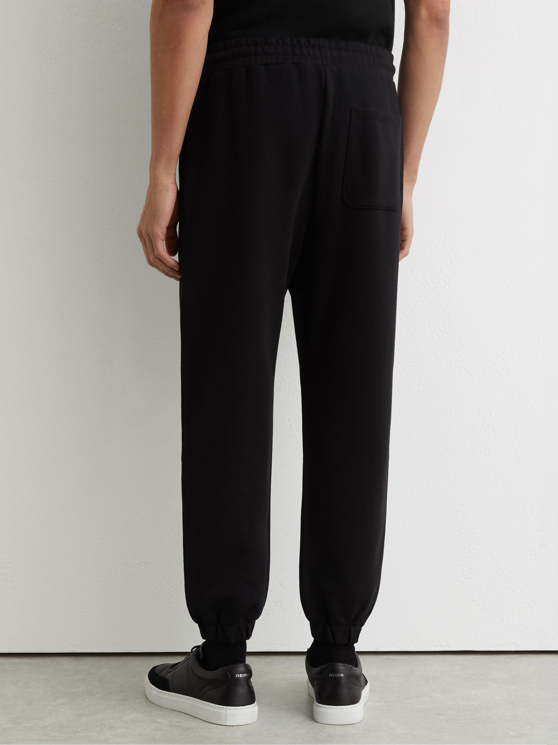 Cotton Logo-Print Cuffed Joggers in Black - Image 5 of 6