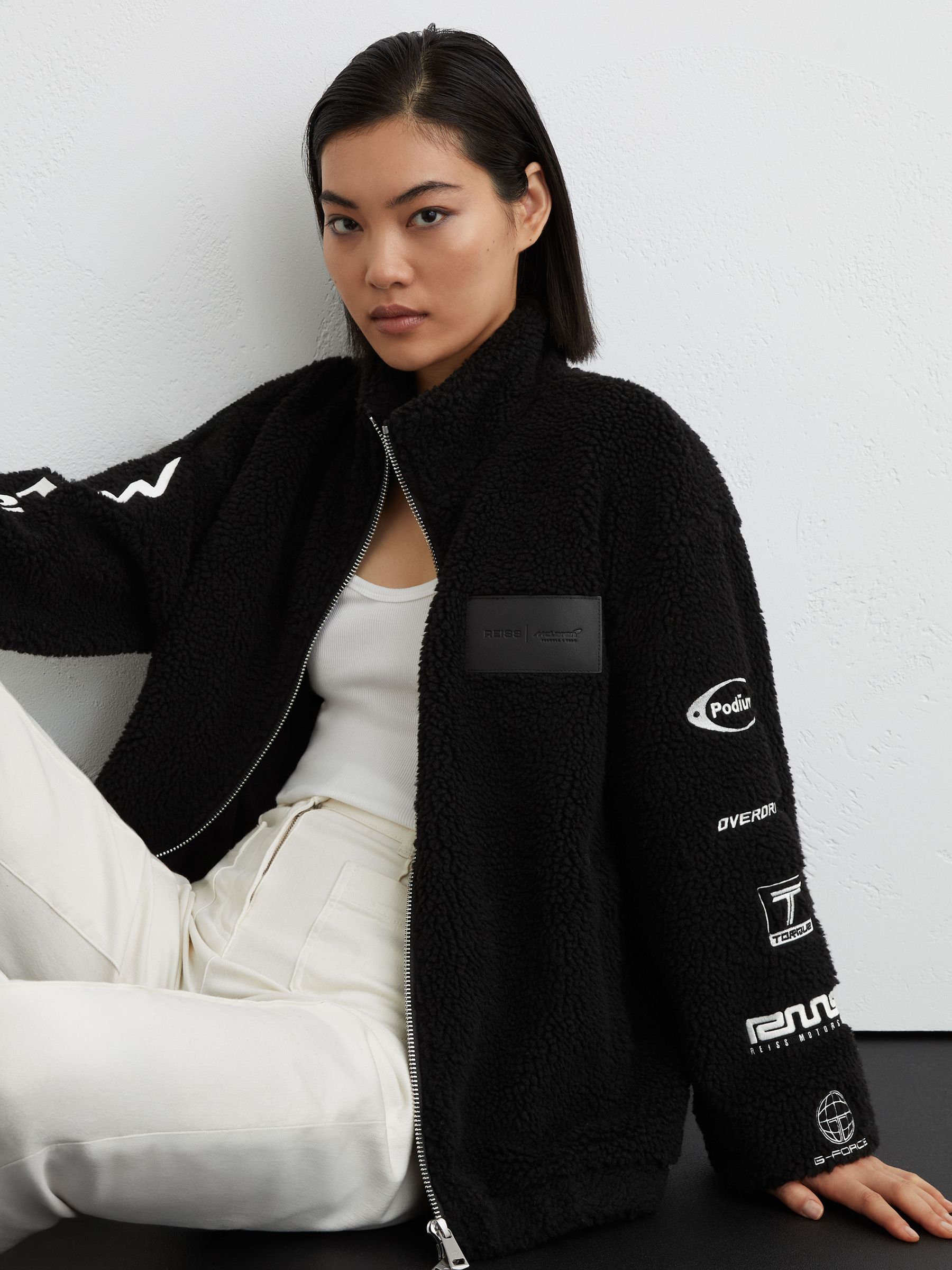 McLaren Black Racing Logo Fleece Jacket Unisex-Fit in Black - Image 1 of 9 McLaren Black Racing Logo Fleece Jacket Unisex-Fit in Black - Image 1 of 9