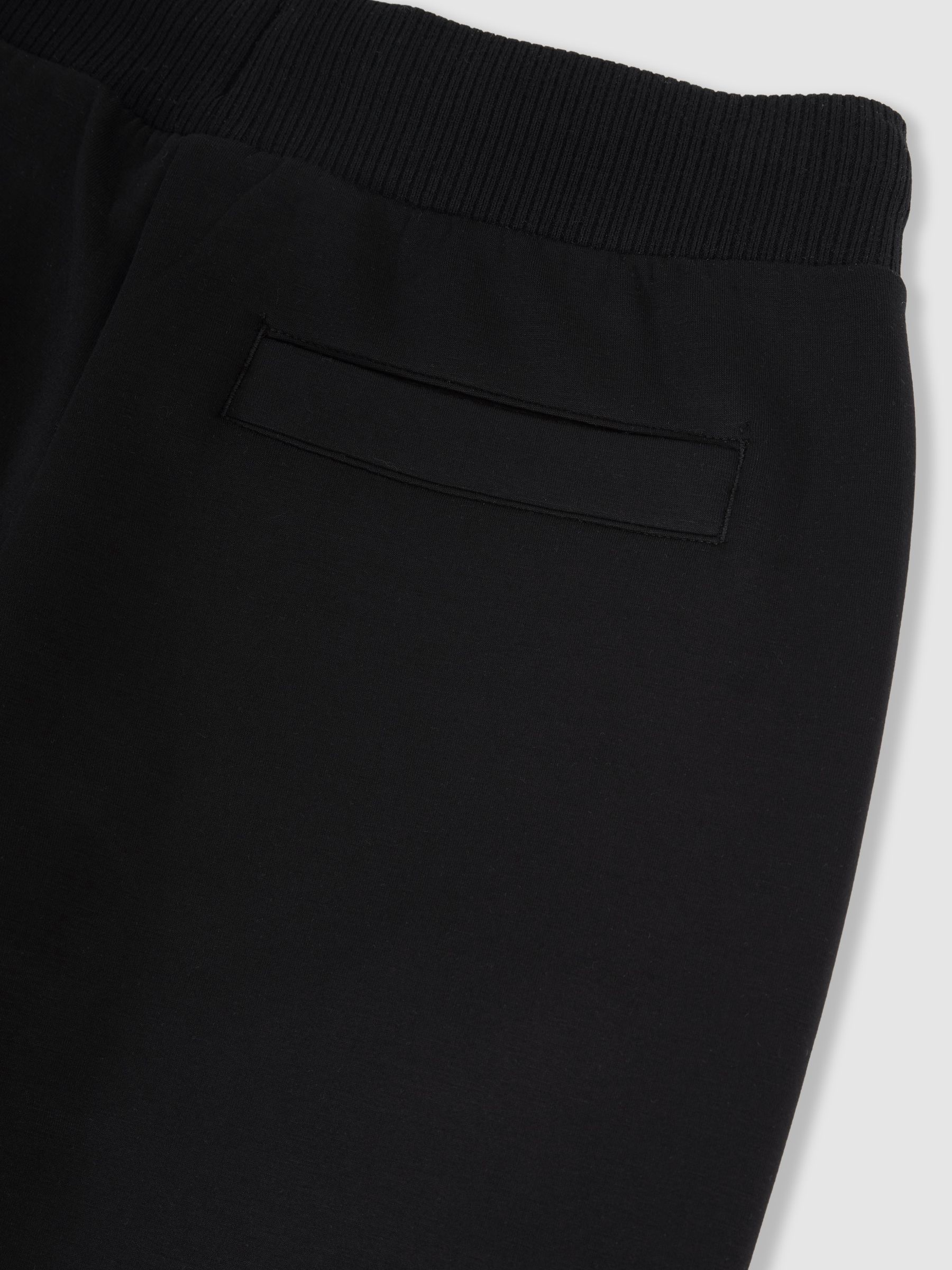 Interlock-Jogginghosen mit weitem Bein und Kordelzug in Schwarz - Bild 7 von 7