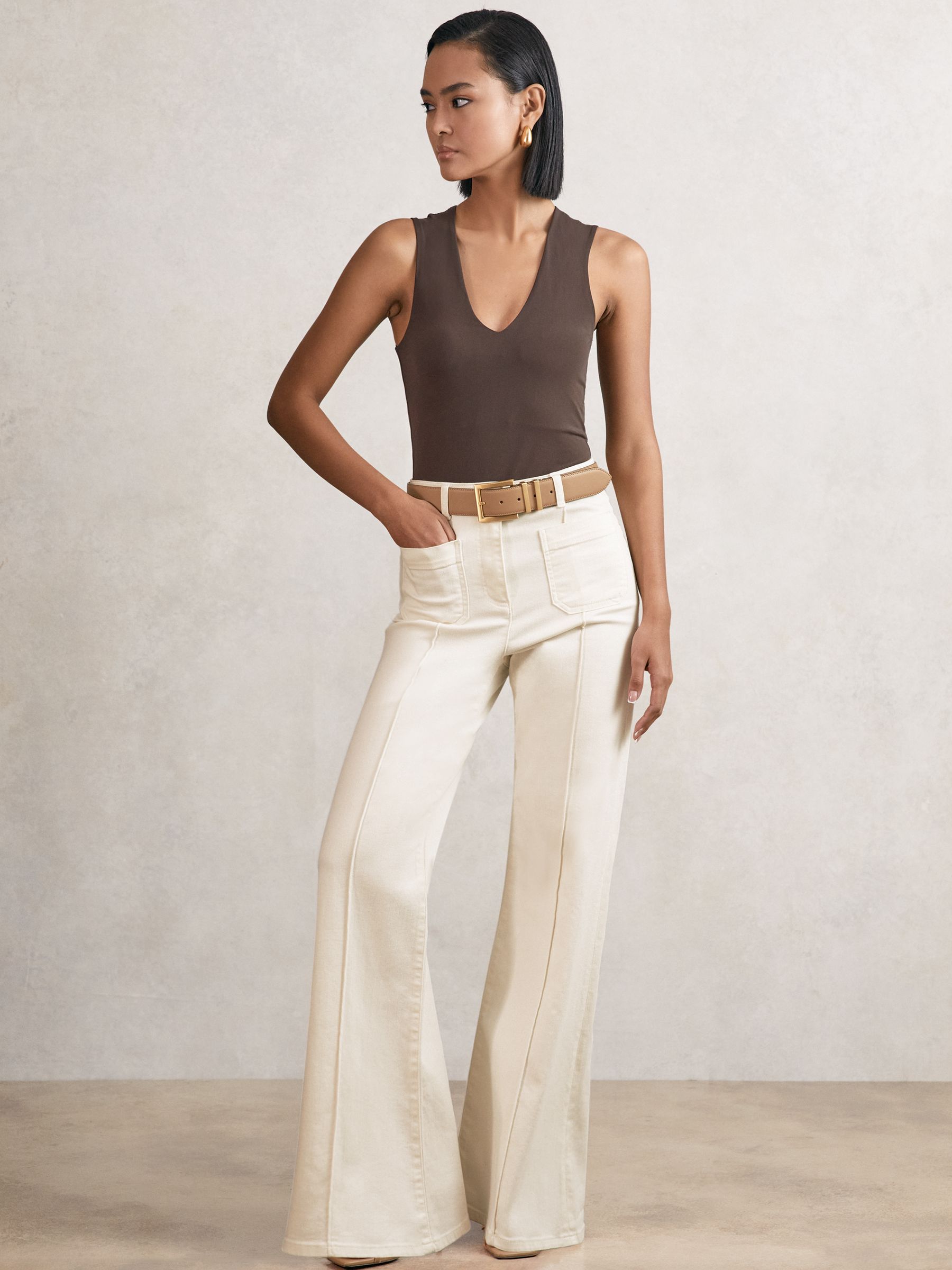 Patch-Pocket Flared Jeans in Ecru - Image 1 of 6