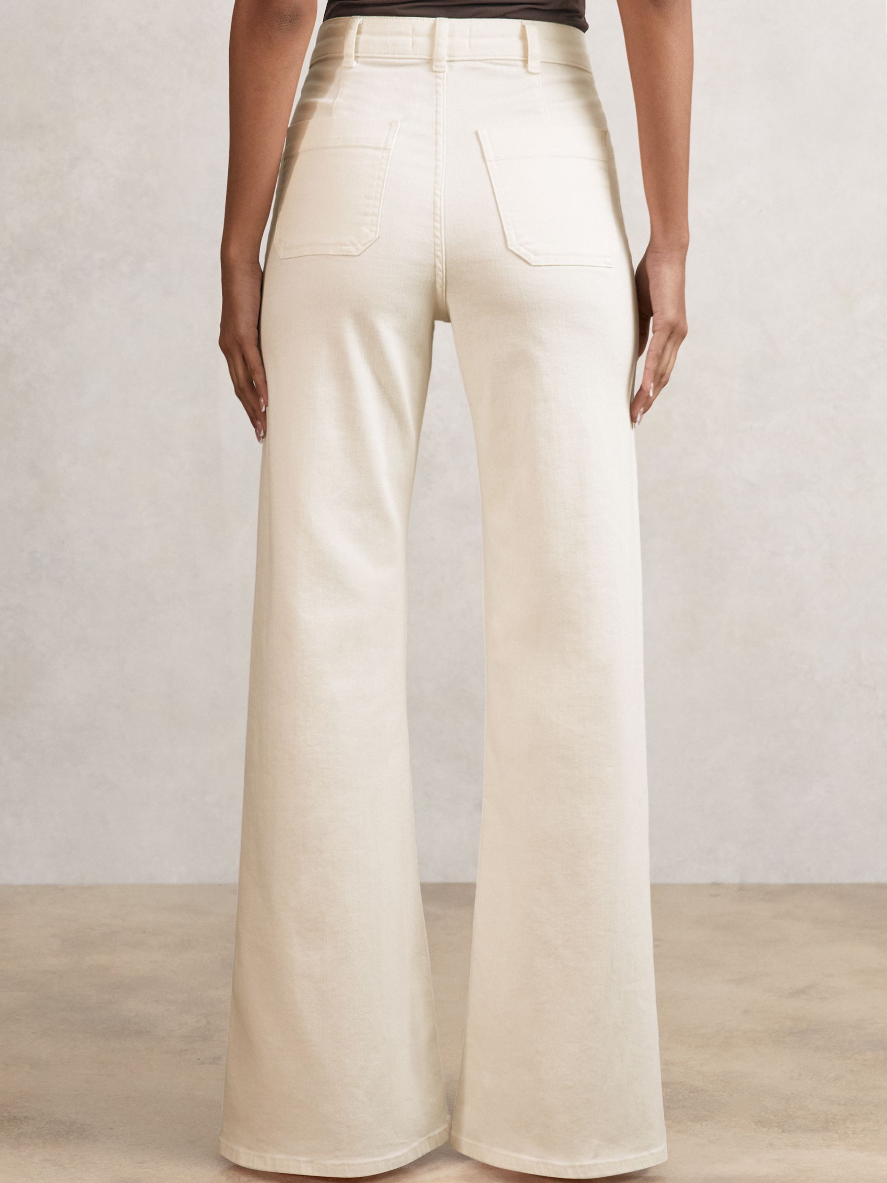 Patch-Pocket Flared Jeans in Ecru - image 4