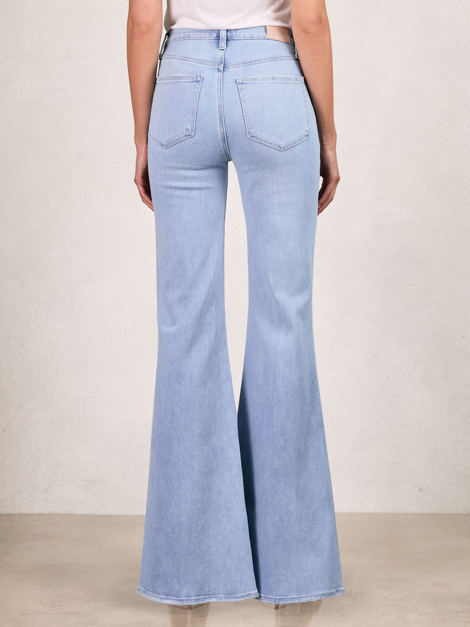 Paige Mid-Rise Flared Jeans in Light Blue - Image 4 of 5