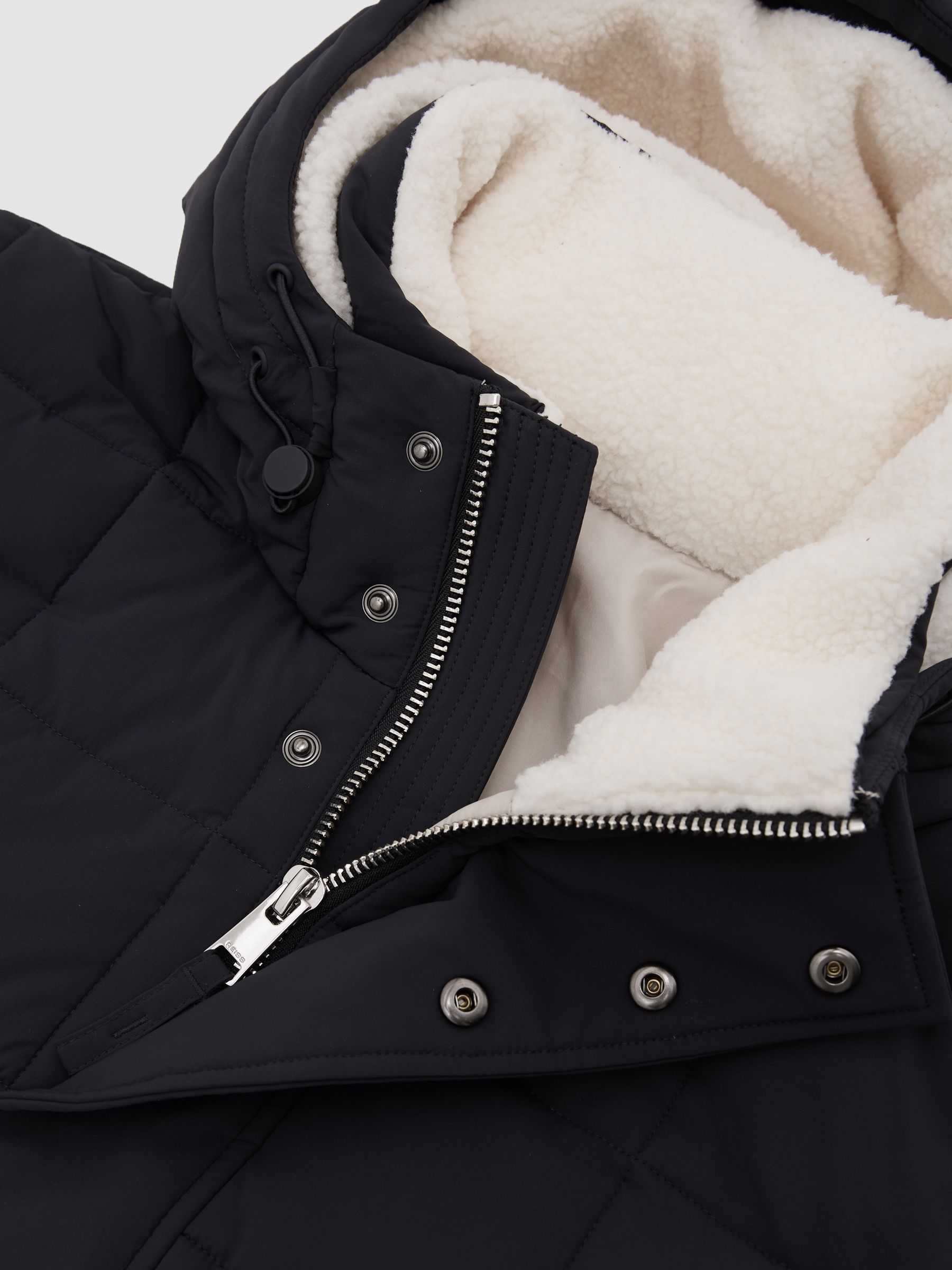 Fleece-Lined Hooded Puffer Jacket in Navy - image 4