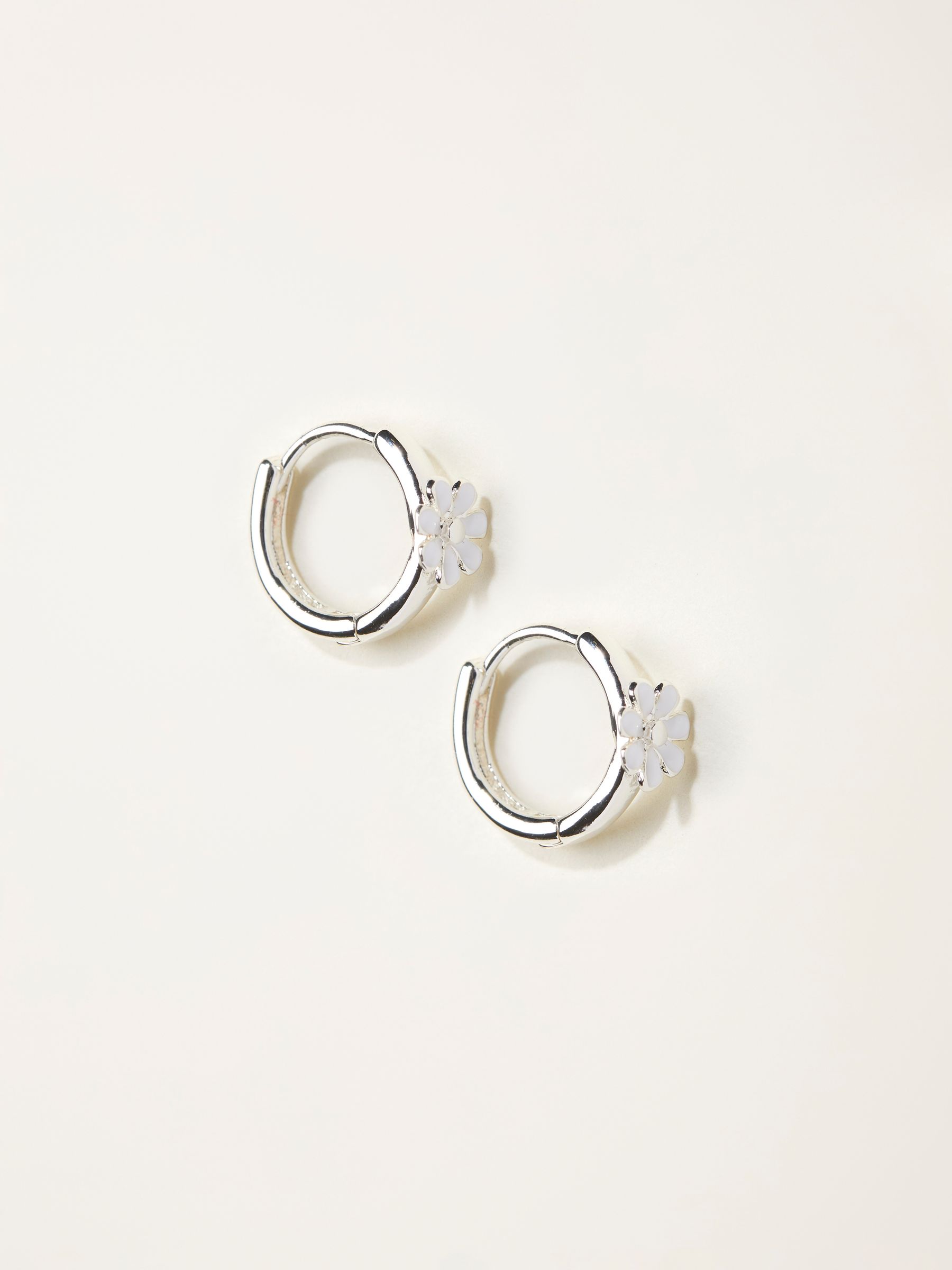 White Daisy Huggie Earrings - Image 1 of 2
