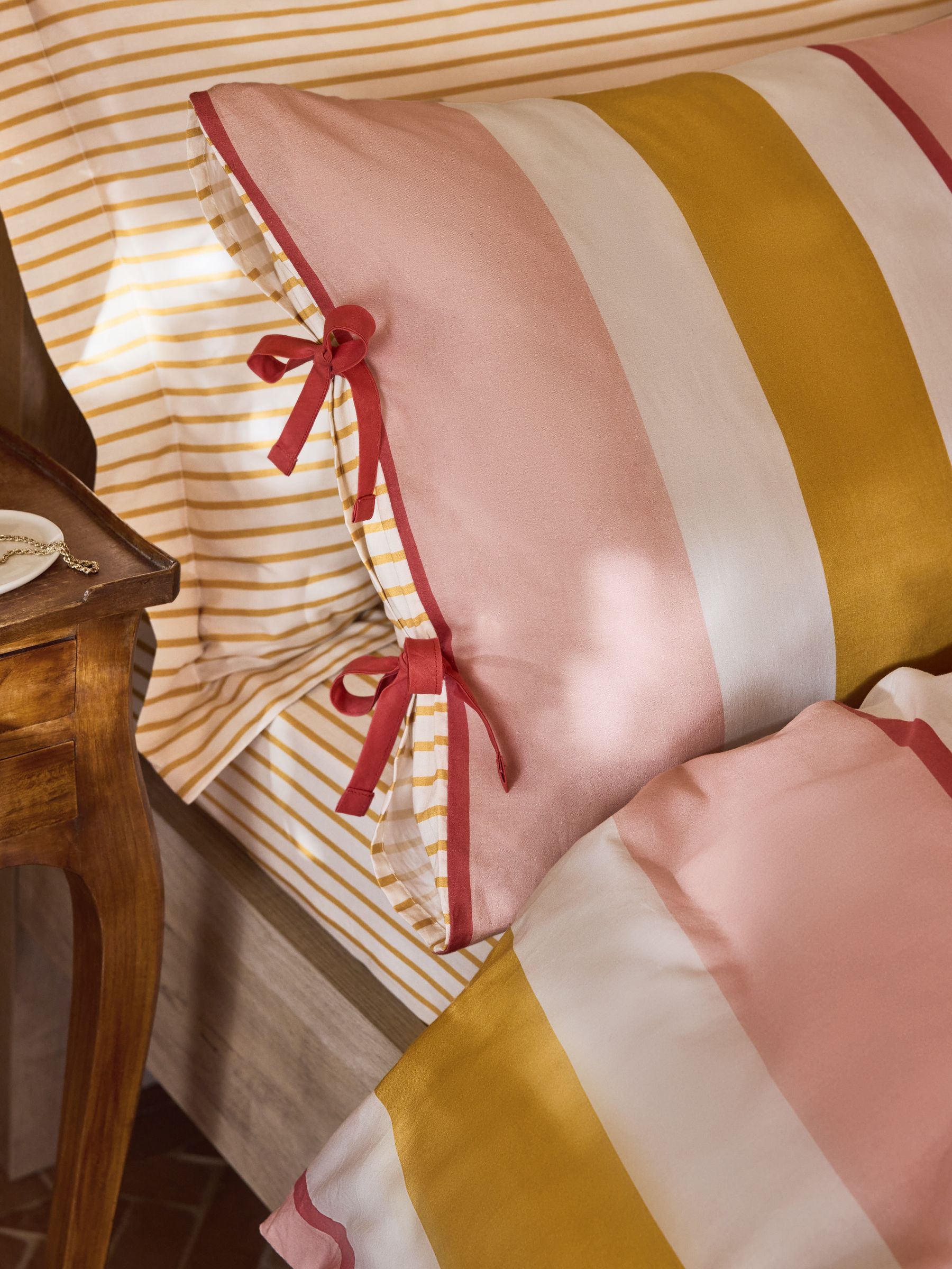 Pink/Ochre Stripe Bows Duvet Cover and Pillowcase Set - Image 5 of 6