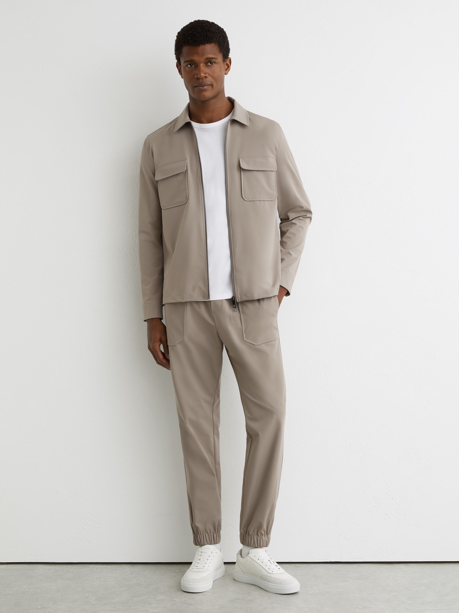 Technical Cuffed Drawstring Trousers in Taupe Brown - Image 1 of 7