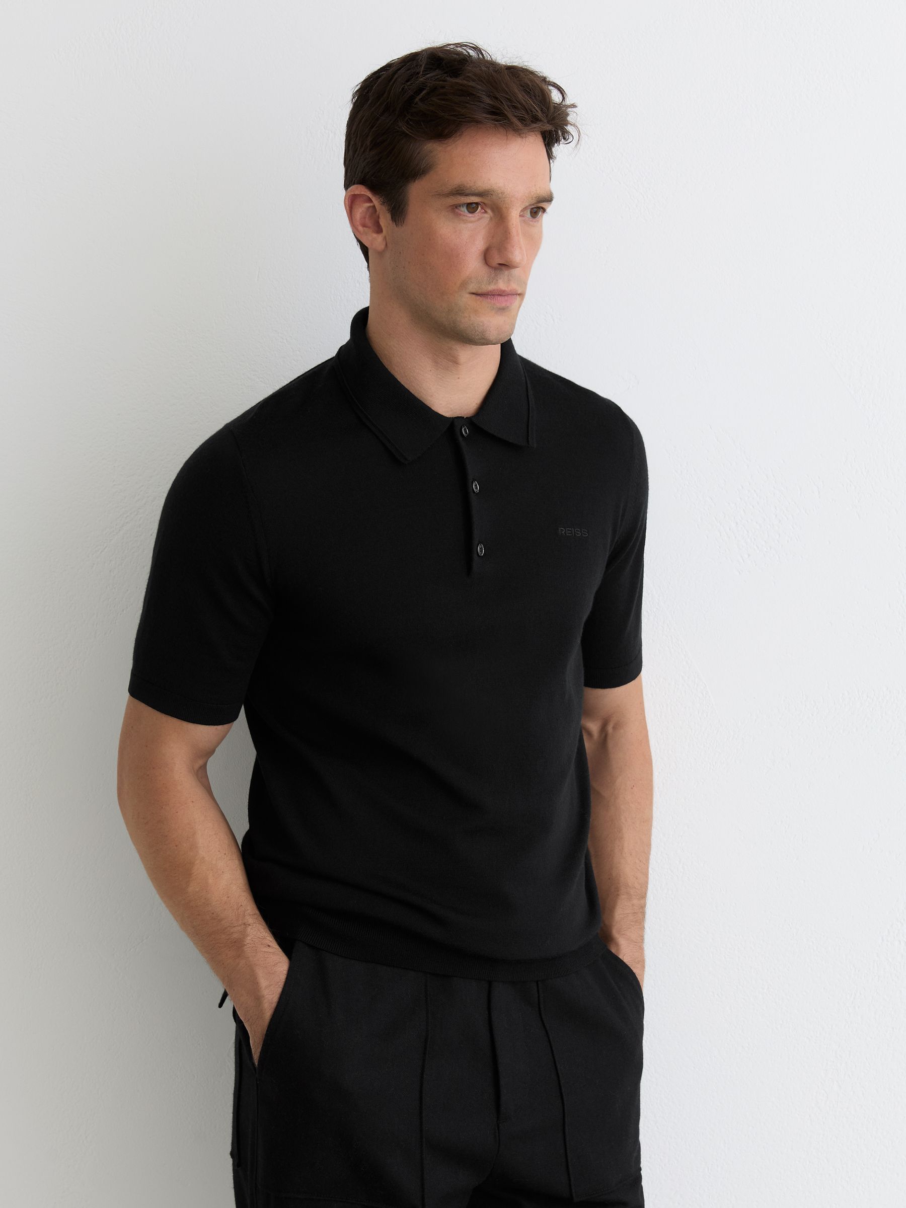 Merino Wool Logo Polo Shirt in Black - Image 1 of 6 Merino Wool Logo Polo Shirt in Black - Image 1 of 6