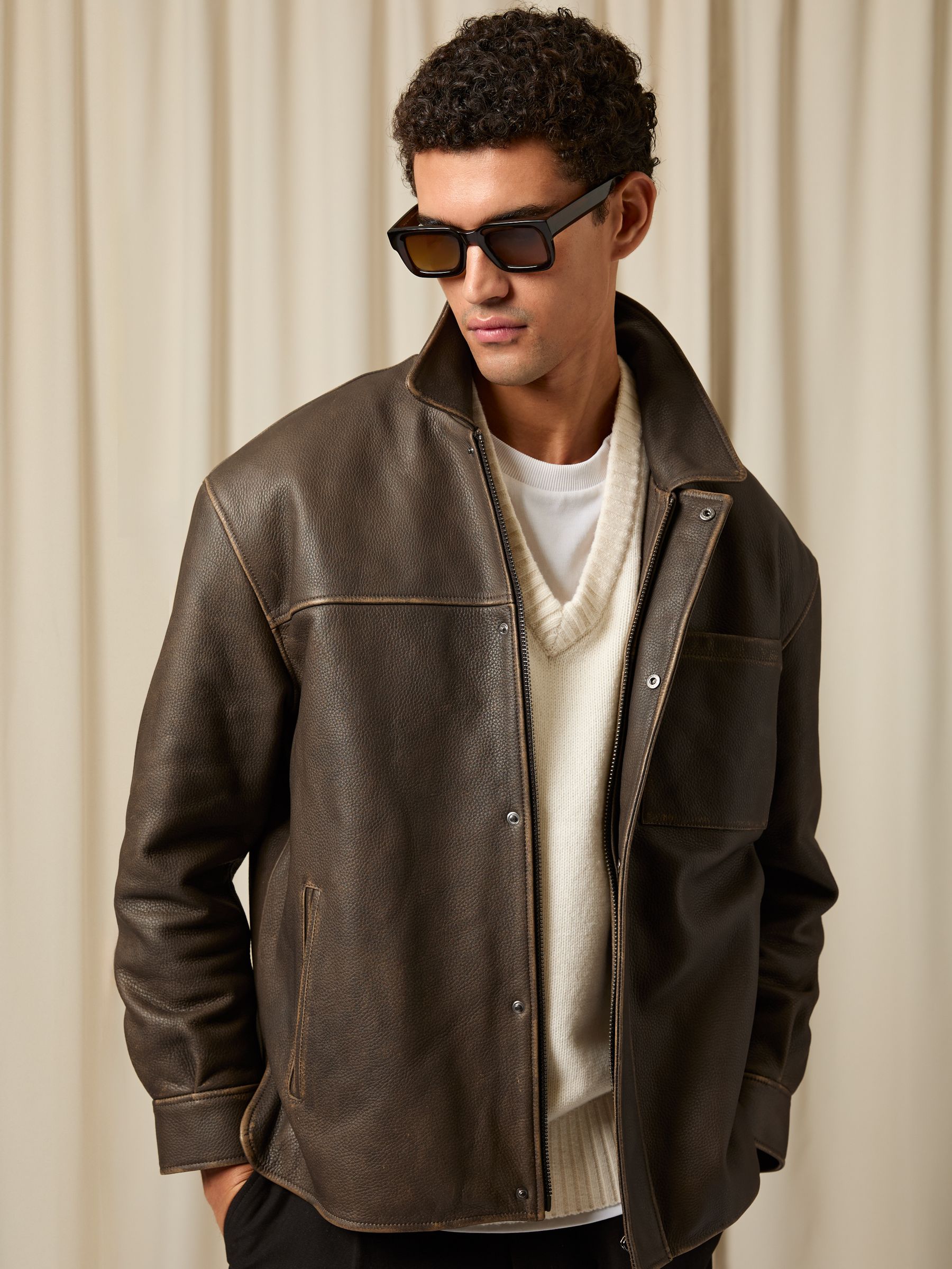 Monogram Embossed Leather Jacket Relaxed-Fit in Brown - Image 1 of 6