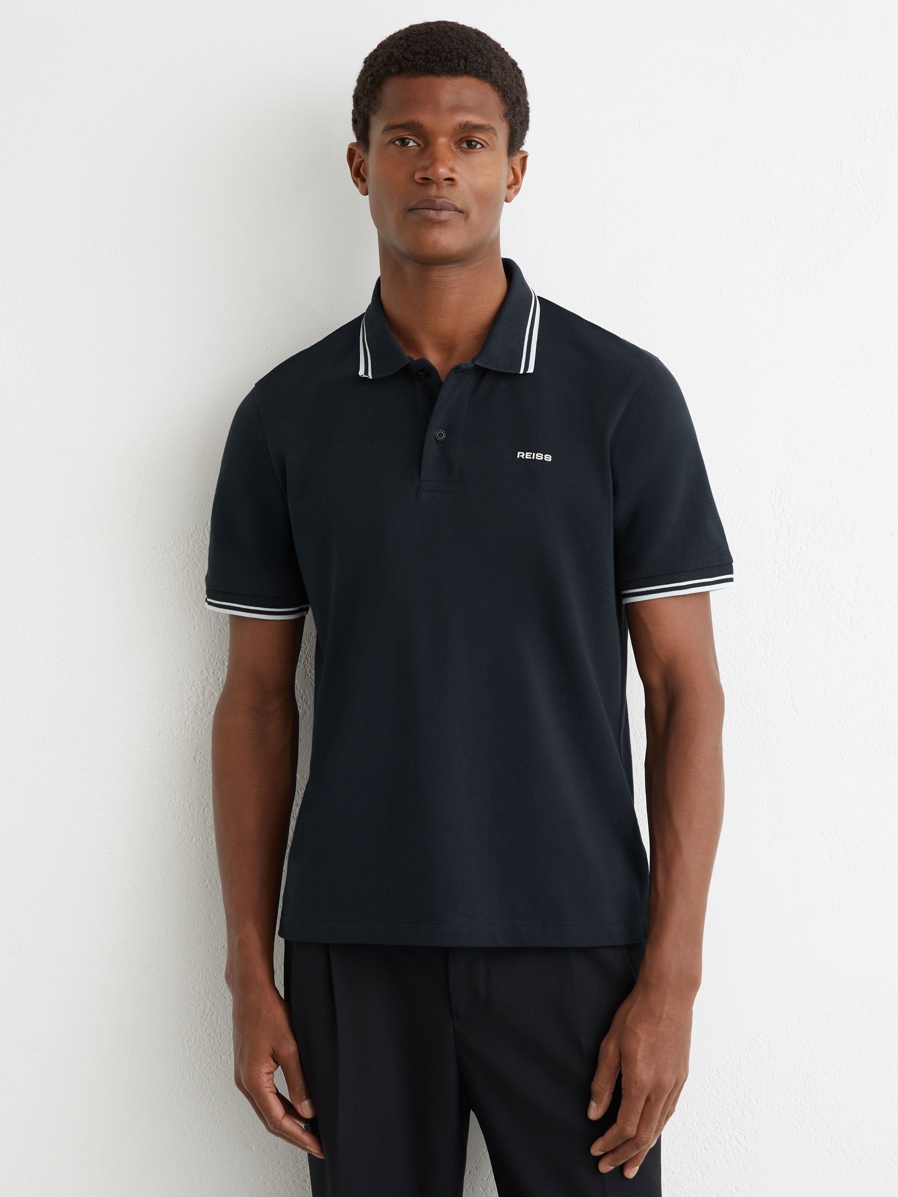 Cotton-Piqué Logo Polo Shirt in Navy - Image 1 of 6