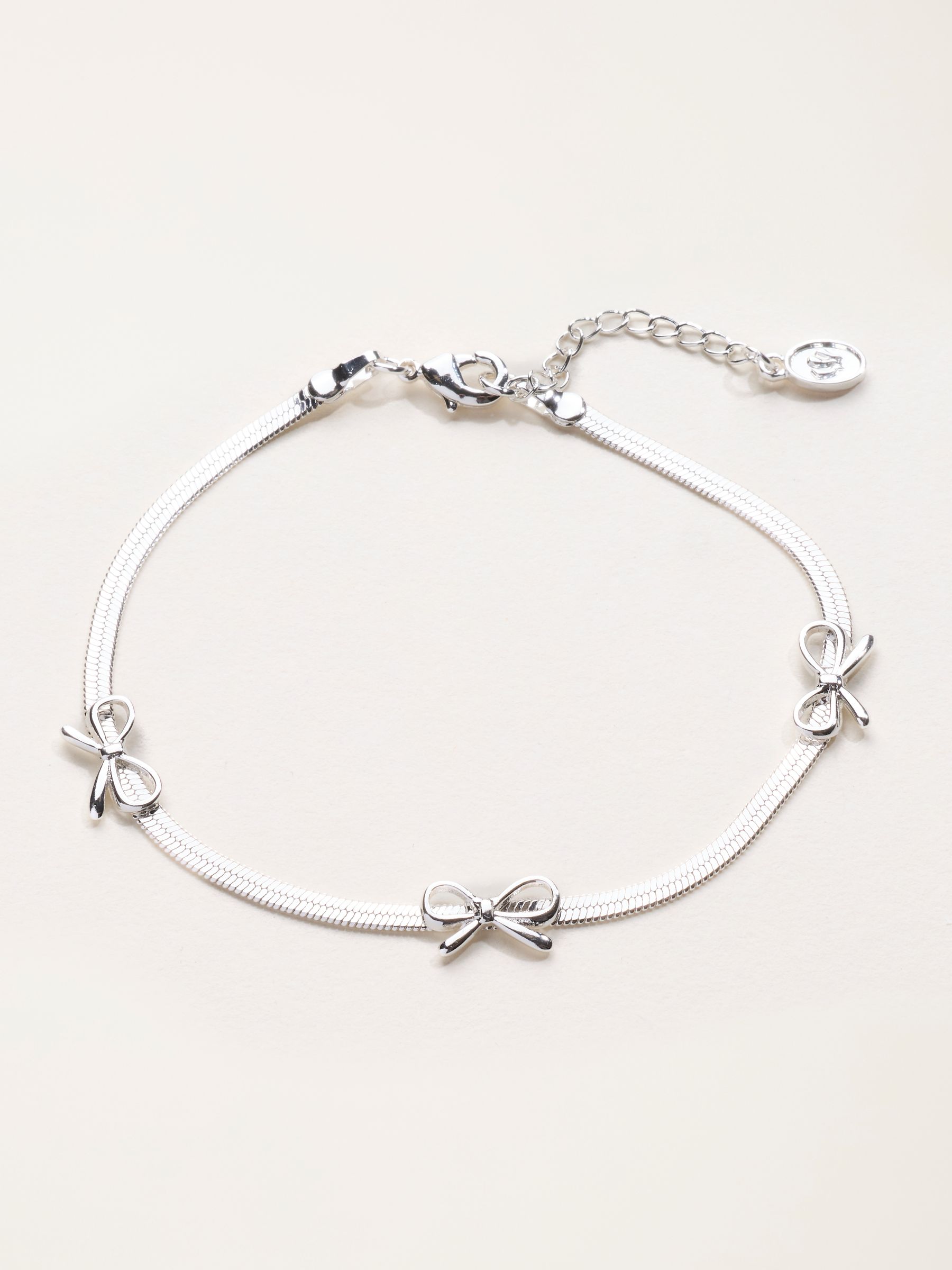 Silver Tone Bow Bracelet - Image 1 of 5