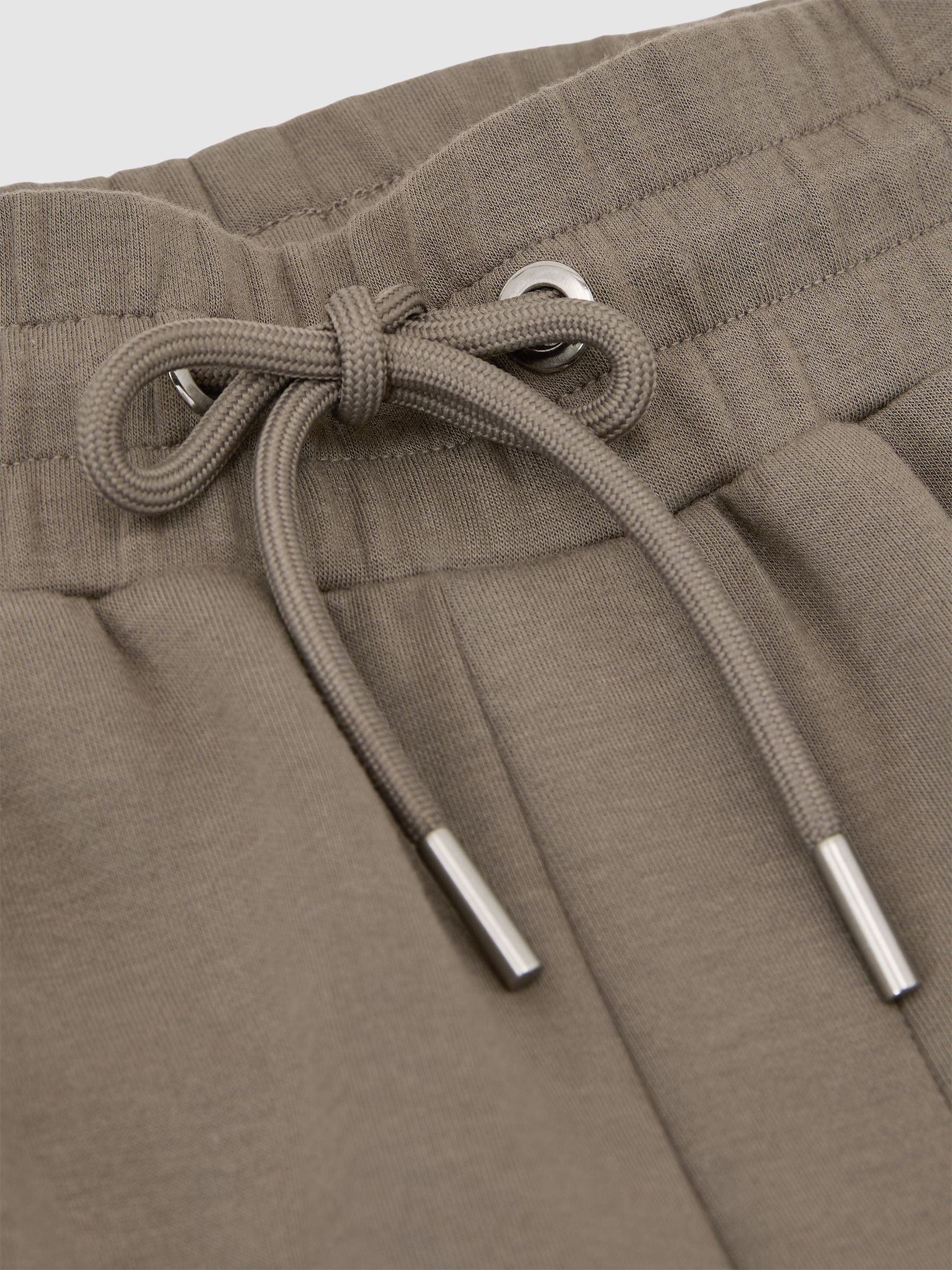 Premium Interlock Relaxed-Fit Joggers in Mushroom Brown - Image 5 of 5