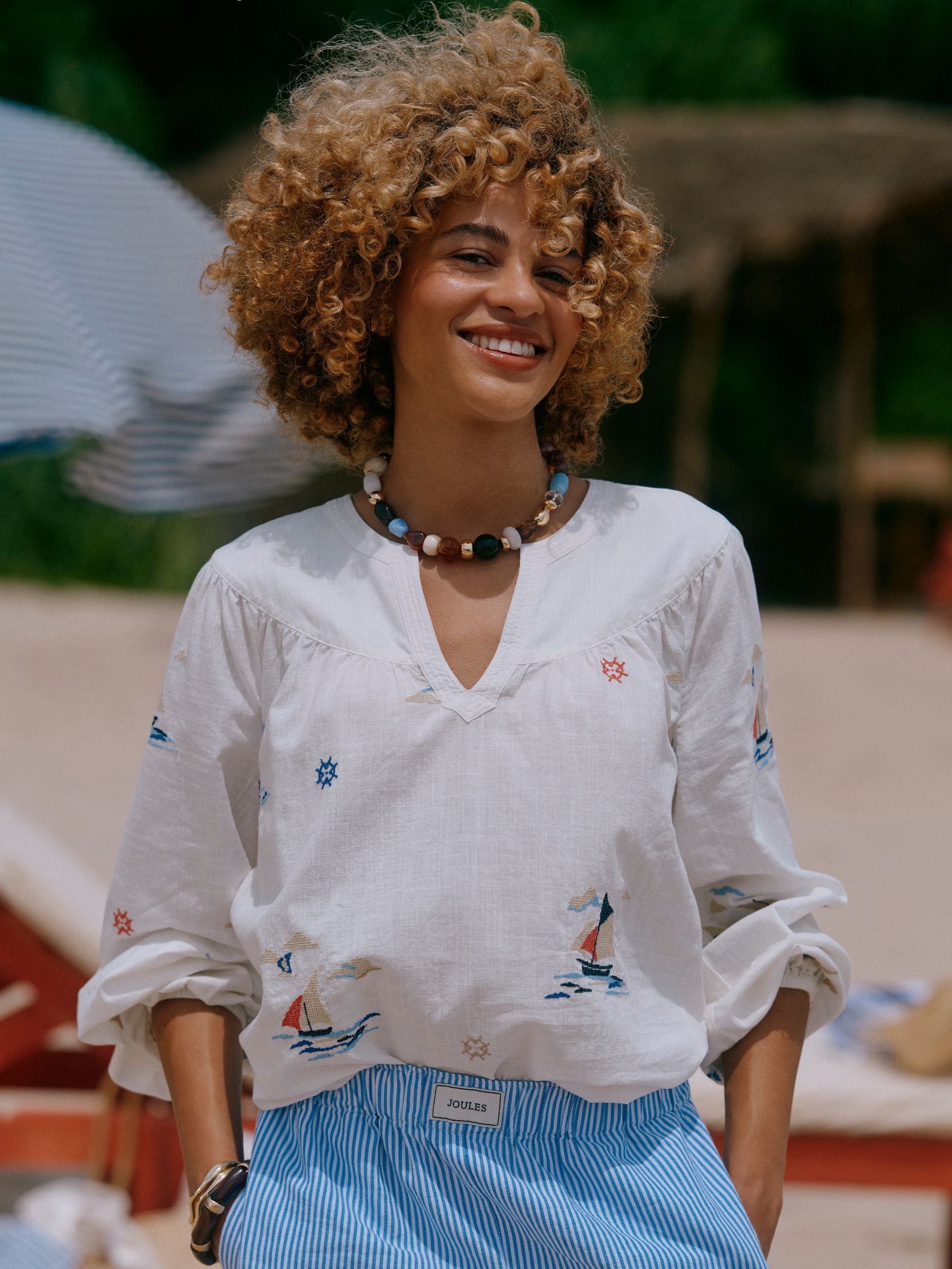 Tilda Cream Embroidered V Neck Popover Long Sleeve Blouse - Image 1 of 9 Tilda Cream Embroidered V Neck Popover Long Sleeve Blouse - Image 1 of 9