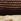 Chocolate Raffia Clutch Bag